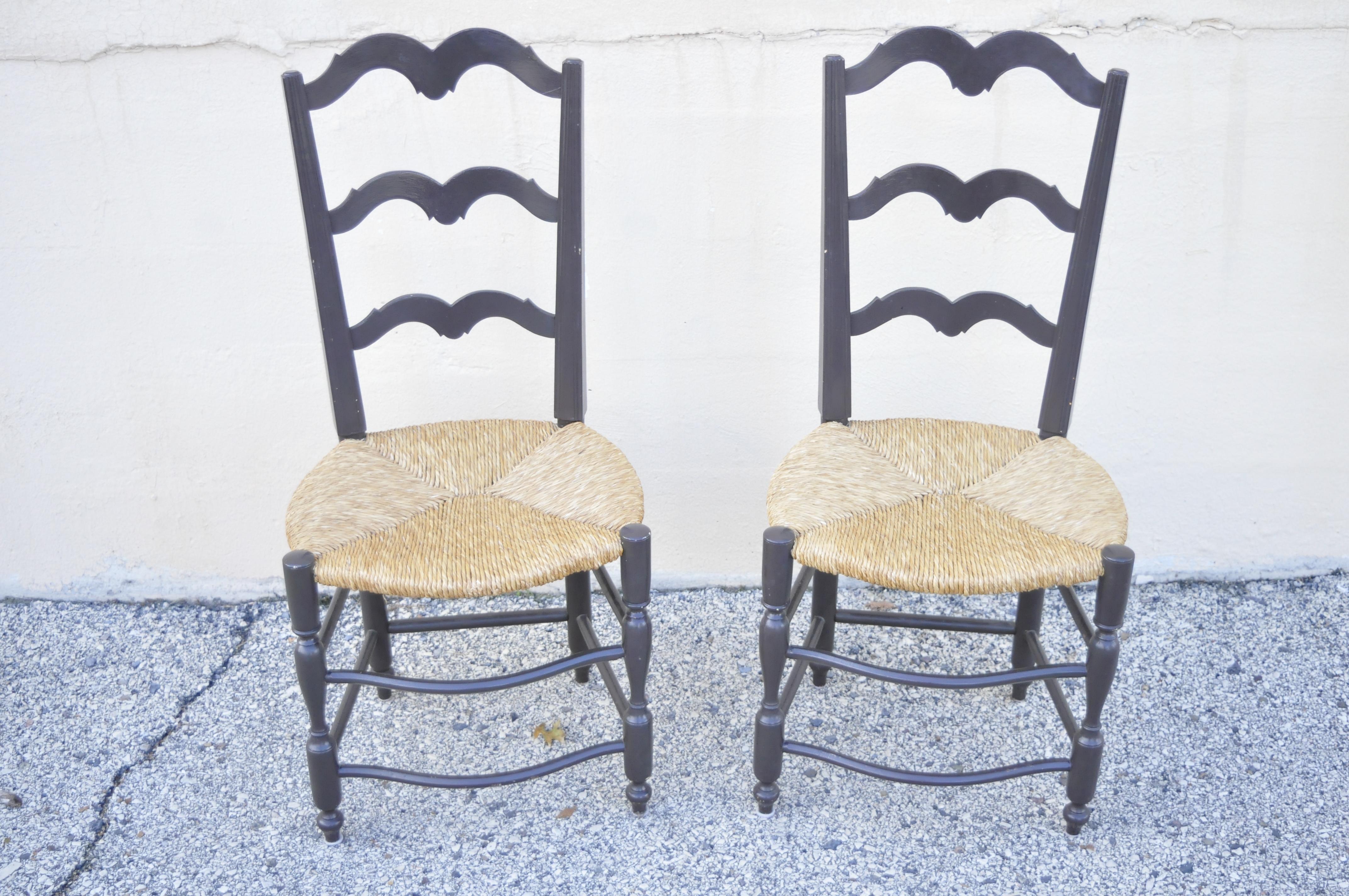 Vintage French Country provincial ladder back rush seat dining chairs signed B. Carles, set of 6. Item features woven rush seats, (6) side chairs, stretcher base, shaped ladder backs, solid wood frame. Nice smaller size chairs. Signed B. Carles to