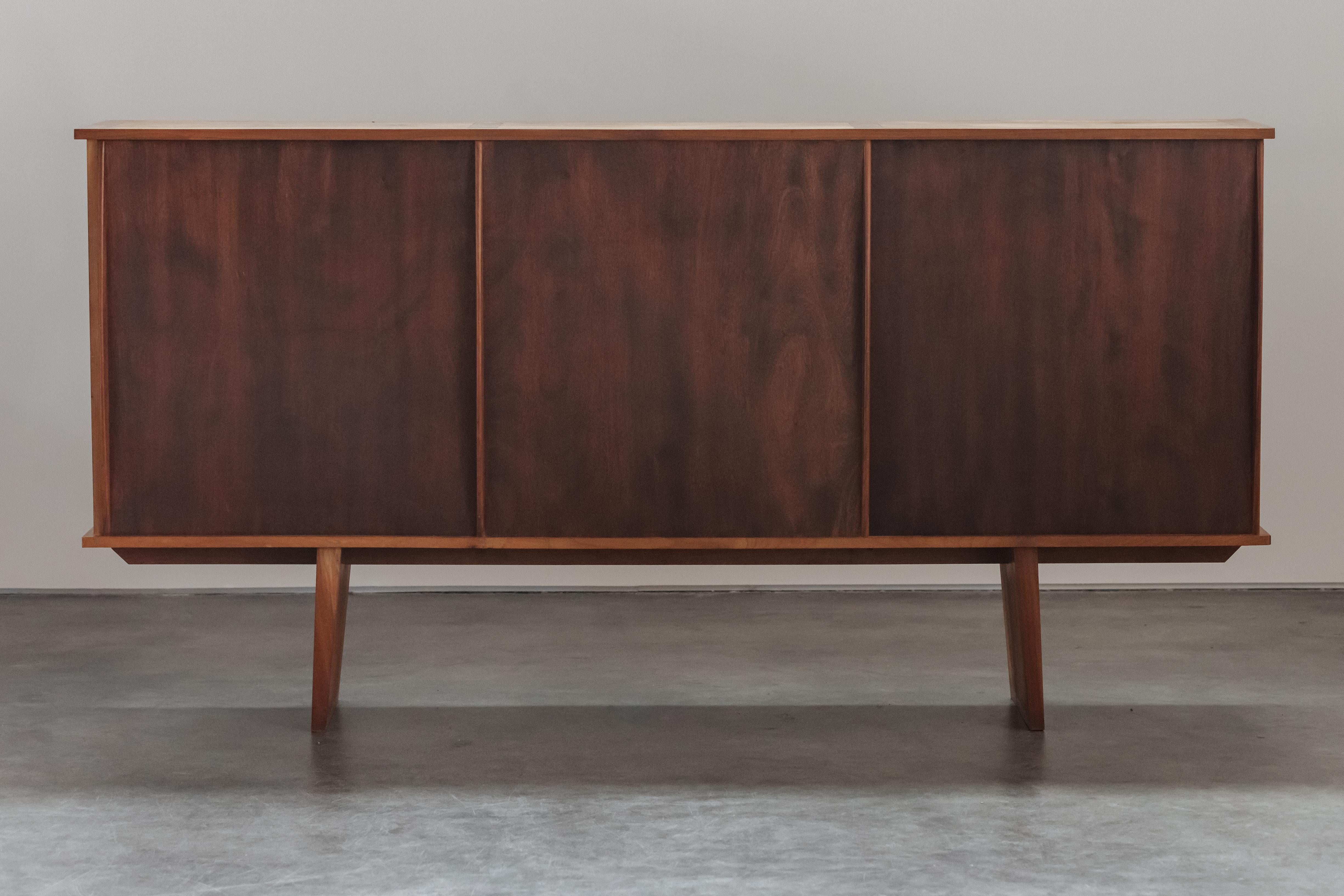 Vintage French Credenza From France, Circa 1960.  Superb model in the style of Prouve.  Oak construction with sliding doors