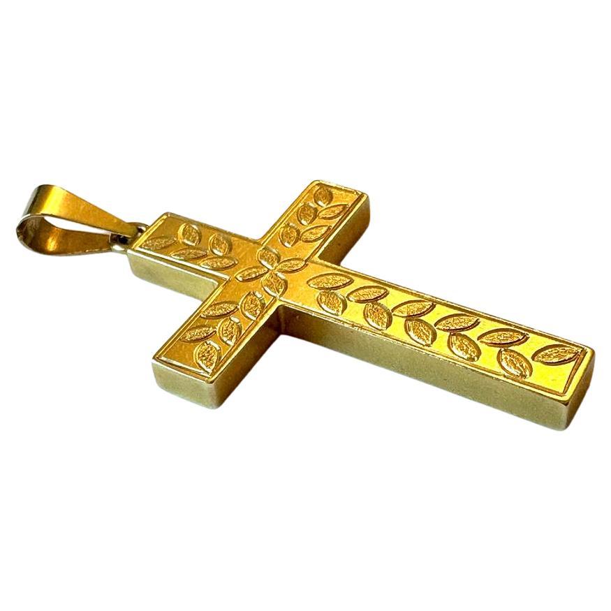 Croix française vintage en or jaune 18 carats avec motifs de feuilles