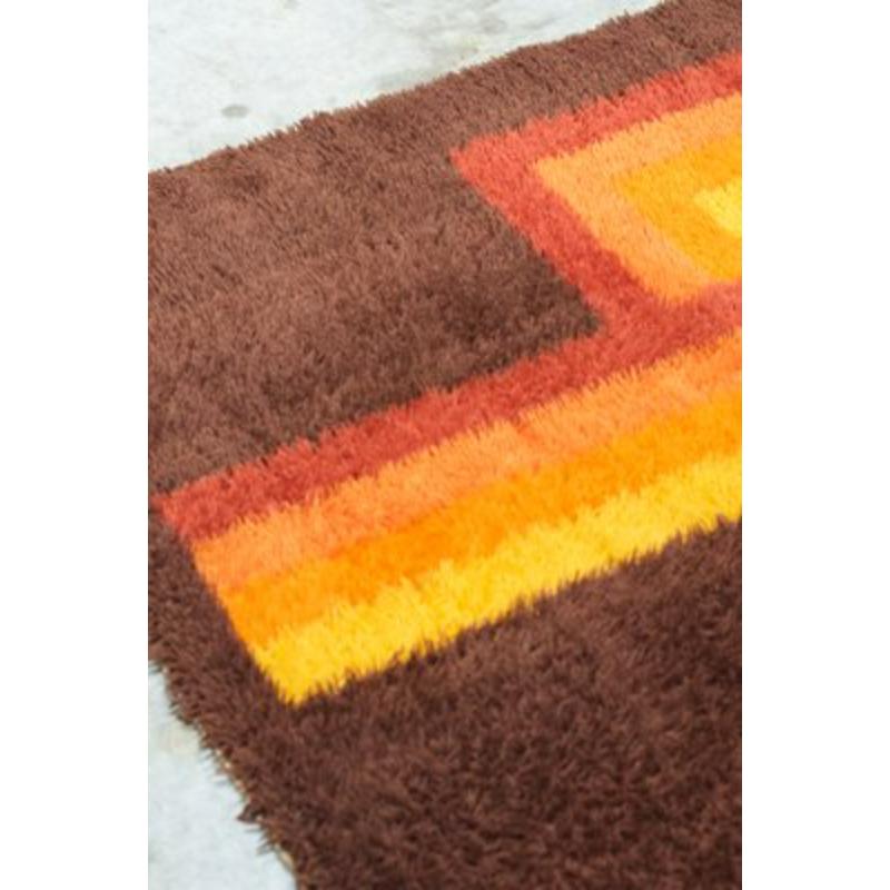 Vintage French Cubist Rug, 1970s

Vintage Design
This rug from the 1970s, design and vintage, could be described as a colorful and daring masterpiece, characterized by geometric and retro patterns. A palette of lively and contrasting colors, through