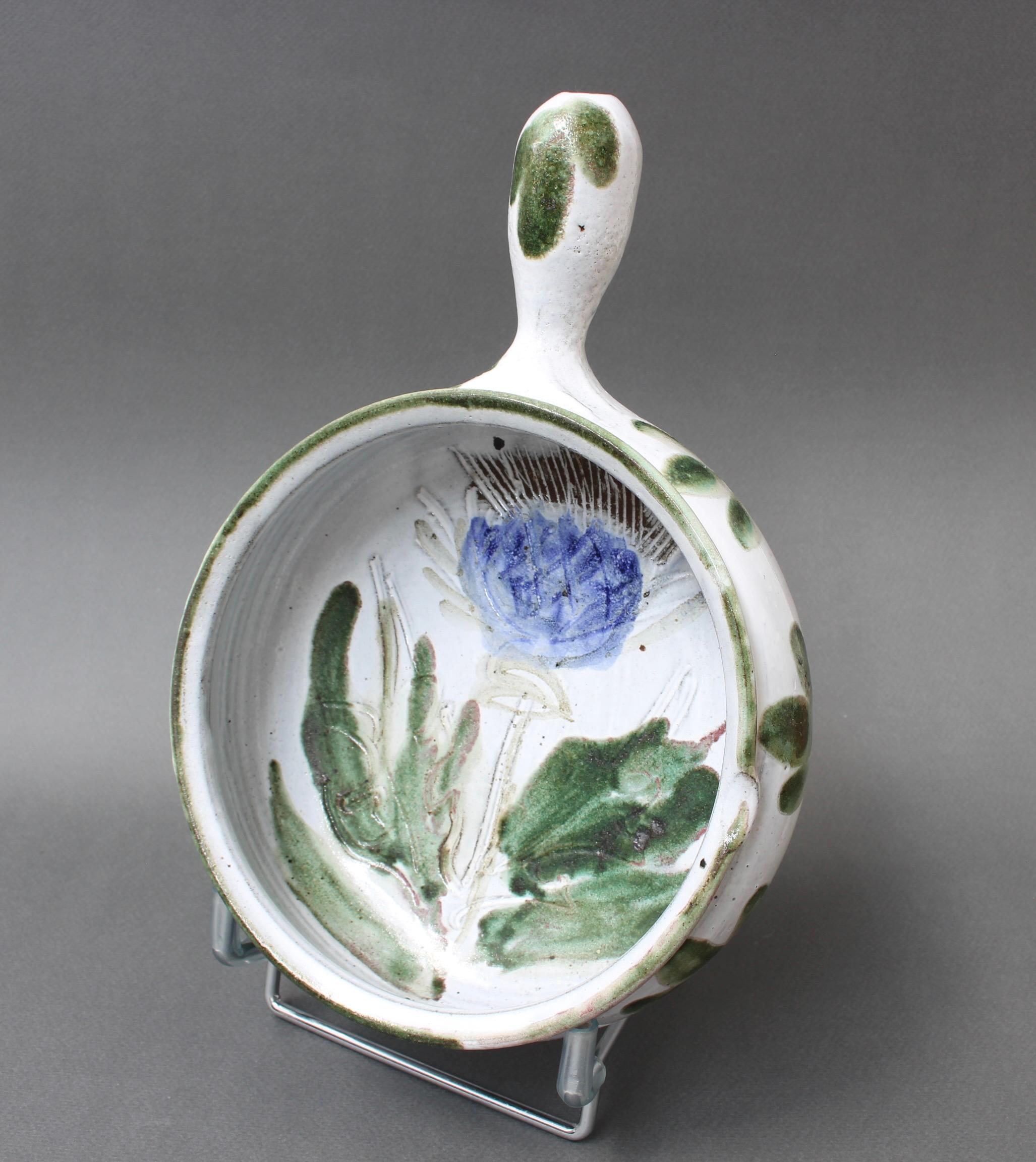 Mid-century decorative soup tureen / dish by Albert Thiry (circa 1960s). A creamy white glaze forms the backdrop for Thiry's trademark blue thistle and foliage decoration. Both visually appealing and tactile, the piece would make an excellent