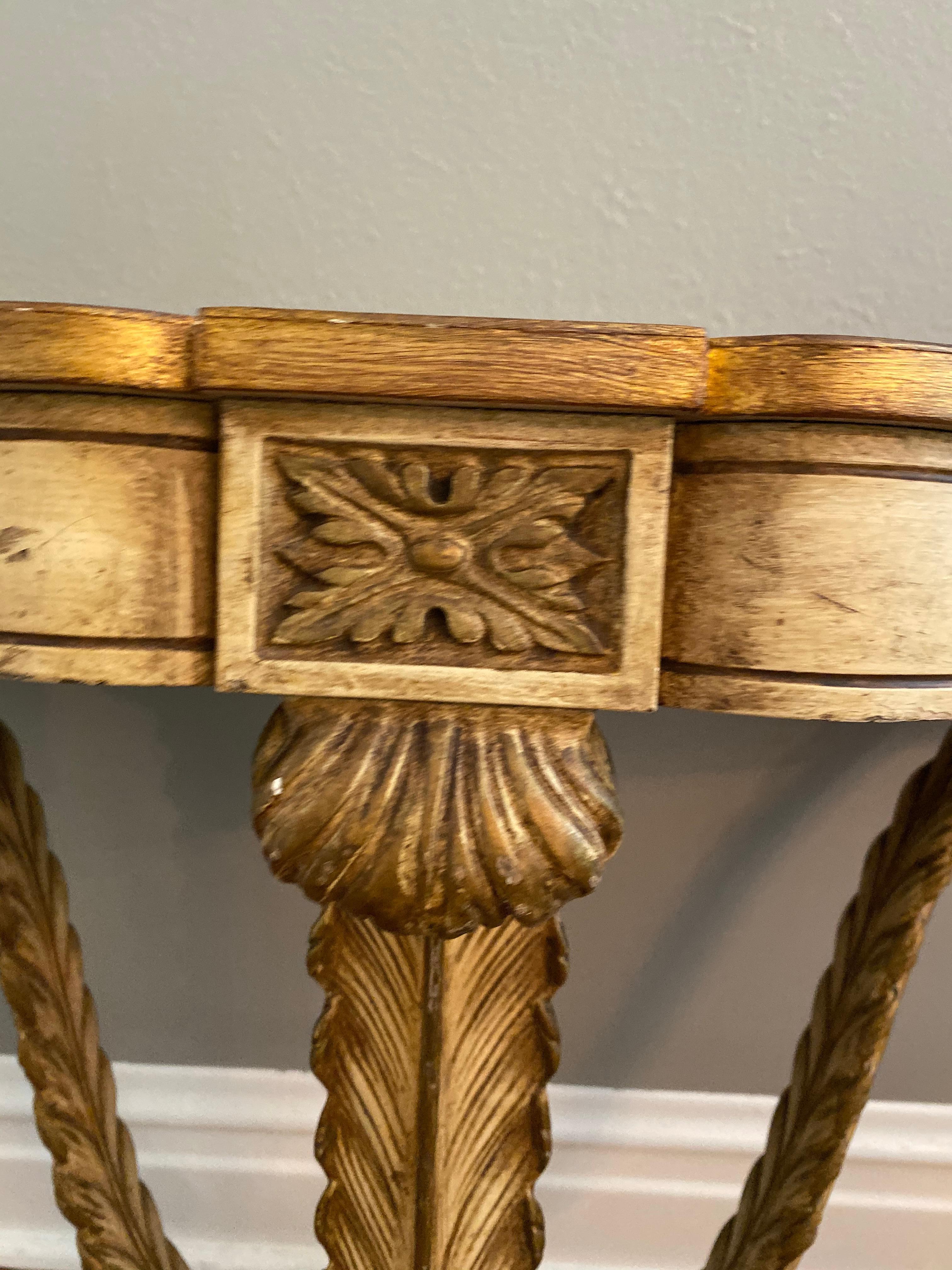Vintage French demilune floating console table
Perfect in your entry way under a fabulous mirror, in a hallway, in the dining room to provide another serving surface, living room for a spotlighted objet d' art.
Hand painted, carved detail,