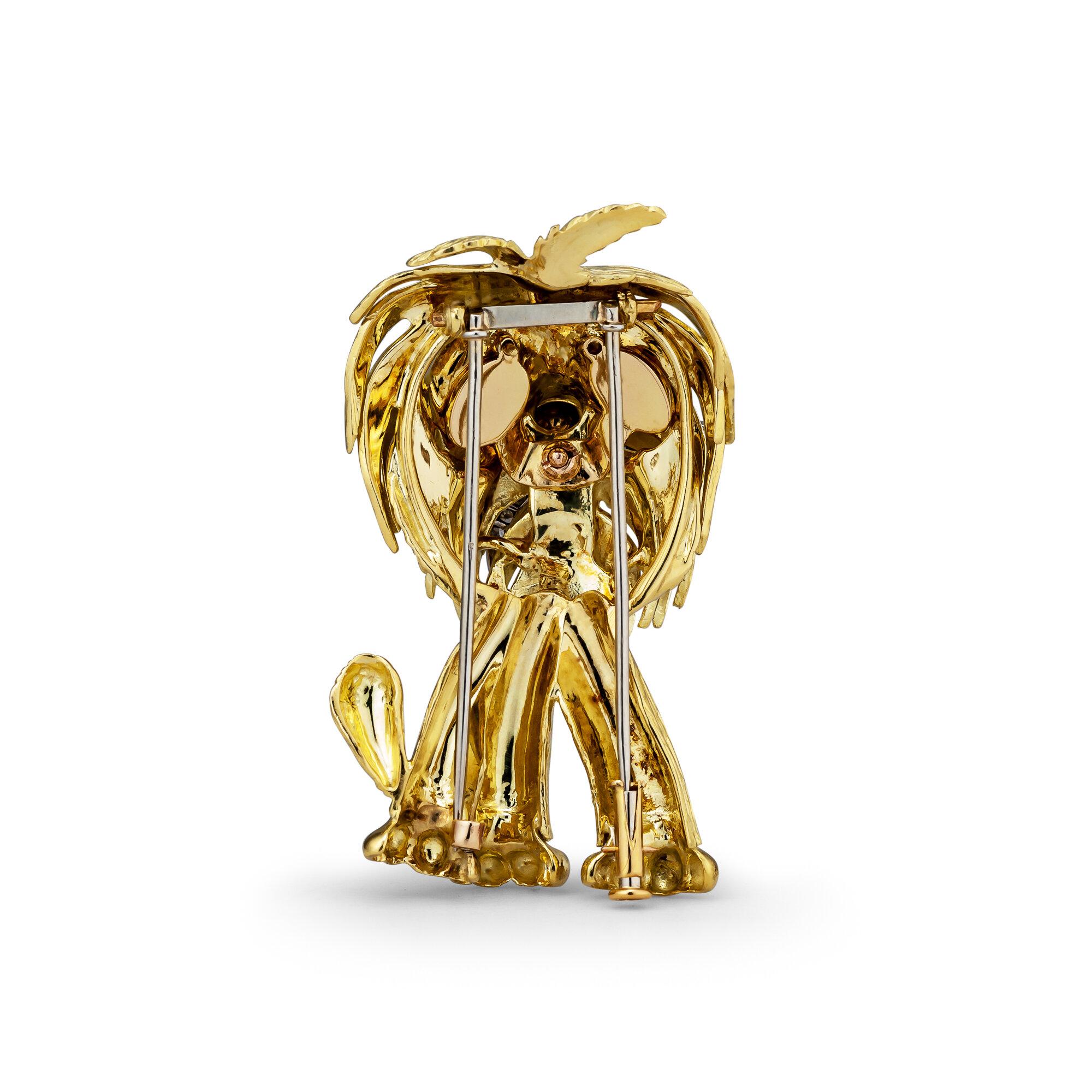 Every dog must have his day, and you will have yours when wearing this French vintage 18 karat yellow gold dog pin.  With diamond whiskers and an enameled tongue, nose, and eyes, this whimsical dog is patiently waiting to make you smile.  Circa