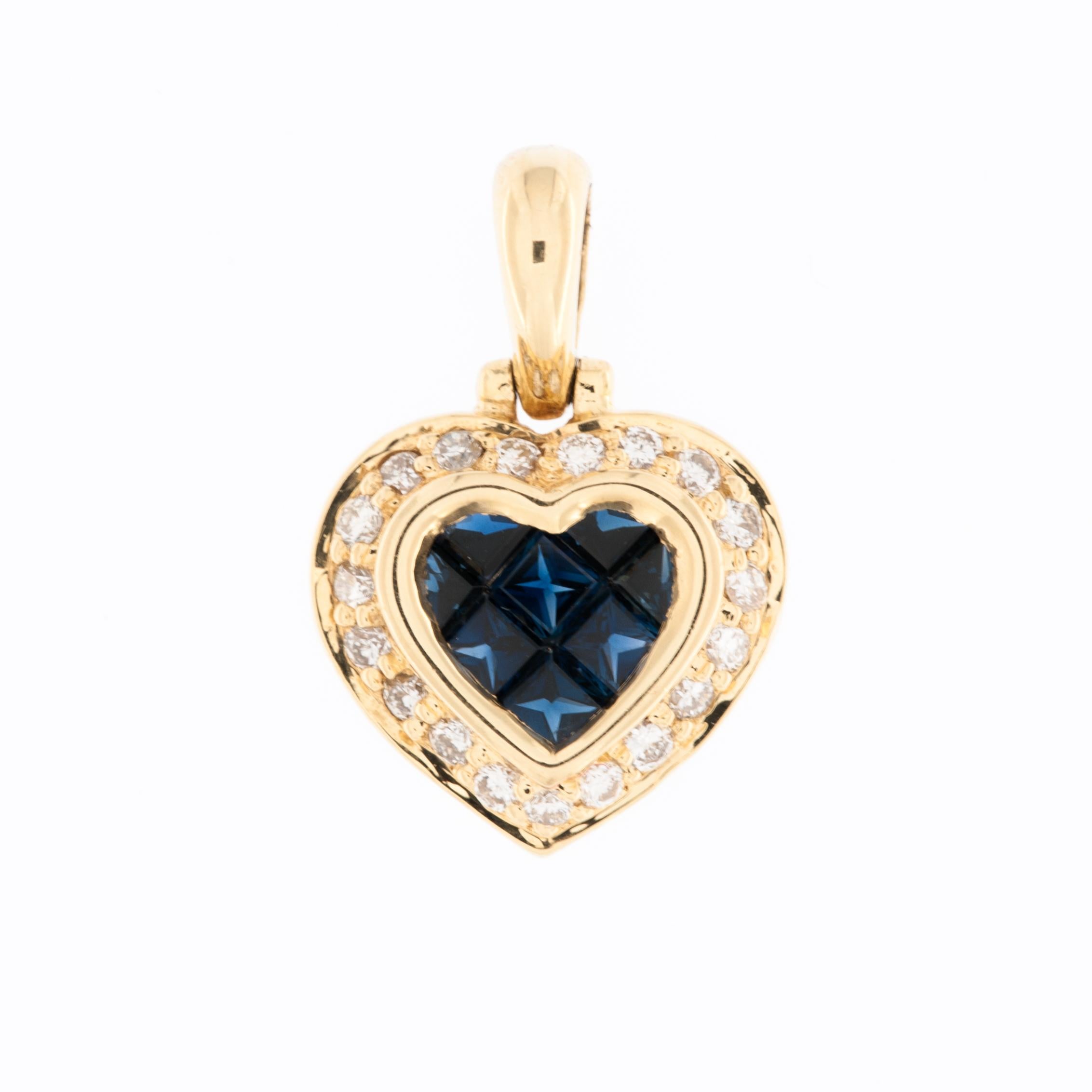 The Vintage French Diamonds and Sapphires Heart Pendant is a captivating and unique piece of jewelry that exudes charm and sophistication. Crafted in 18-karat yellow gold, this pendant features a stunning combination of brilliant cut diamonds and