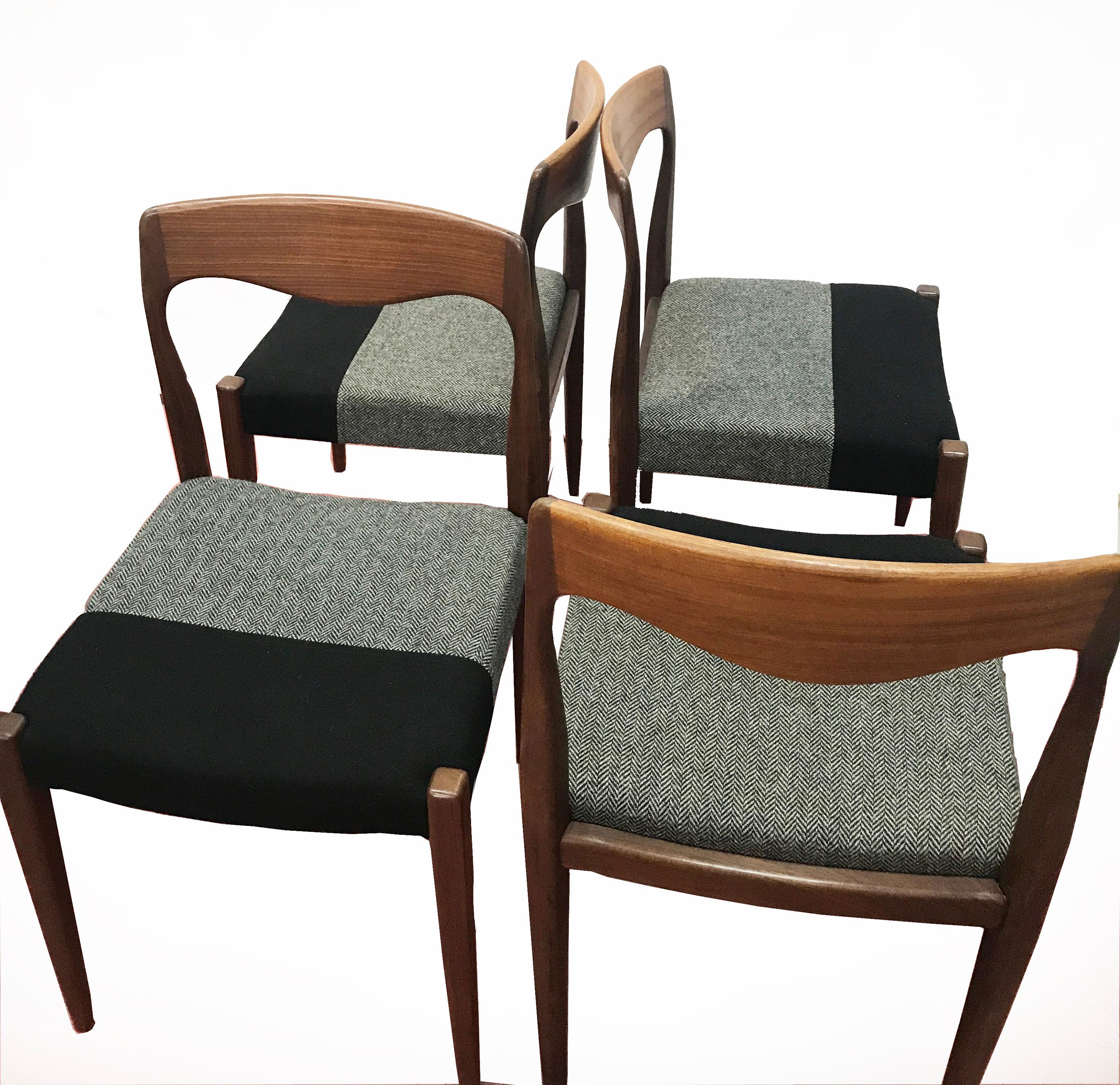 These chairs are of a very good quality, made from tropical wood and birch under the fabric. They have been reupholstered in black wool and black and white sprig pattern wool.