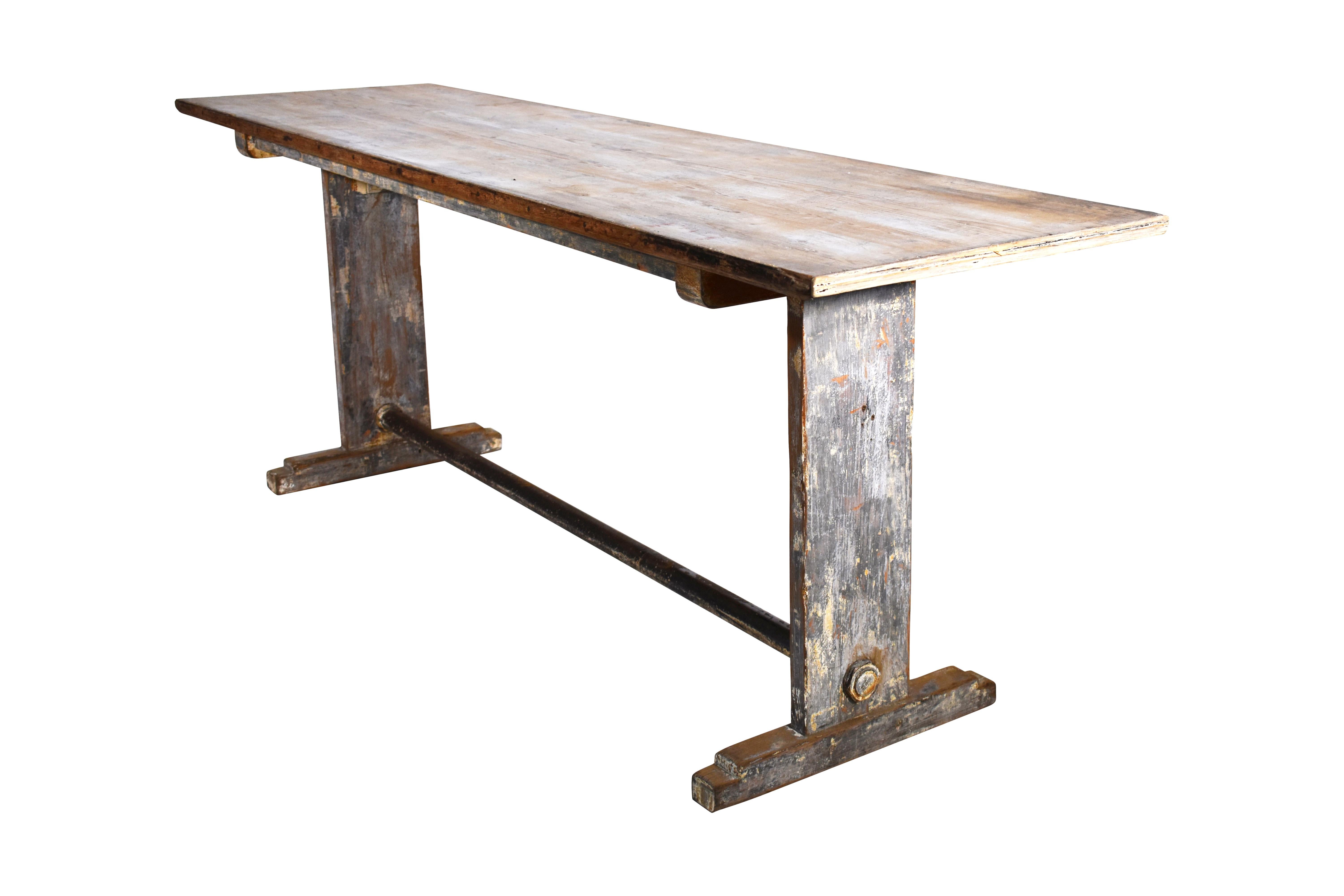 The weathered patina on this vintage dining or bistro table is white with traces of blue. It is perfect in a modern setting with contemporary chairs for dining (Iron Stretcher included) or as a desk with European character, circa 1920-1950.