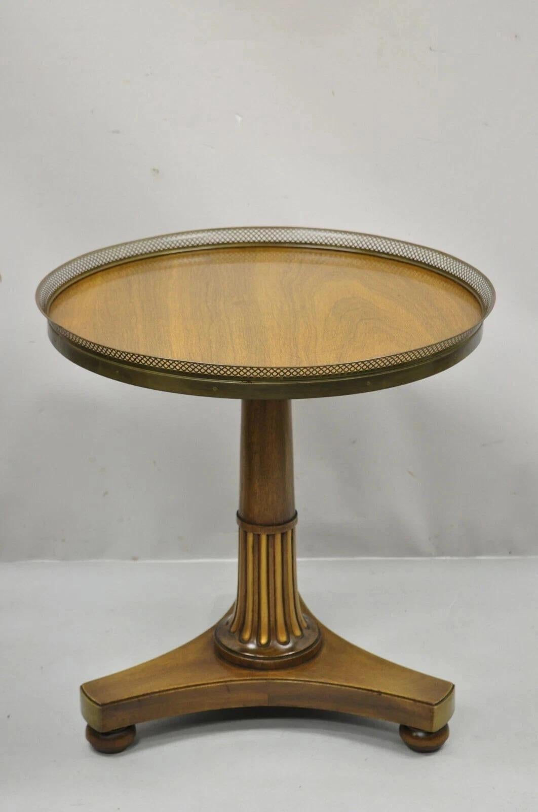 Vintage French Empire Style Mahogany Pedestal Base Round Center Table with Brass Gallery. Item features a pierced brass gallery, pedestal base, gold gilt details, beautiful wood grain, quality American craftsmanship, great style and form. Circa Mid