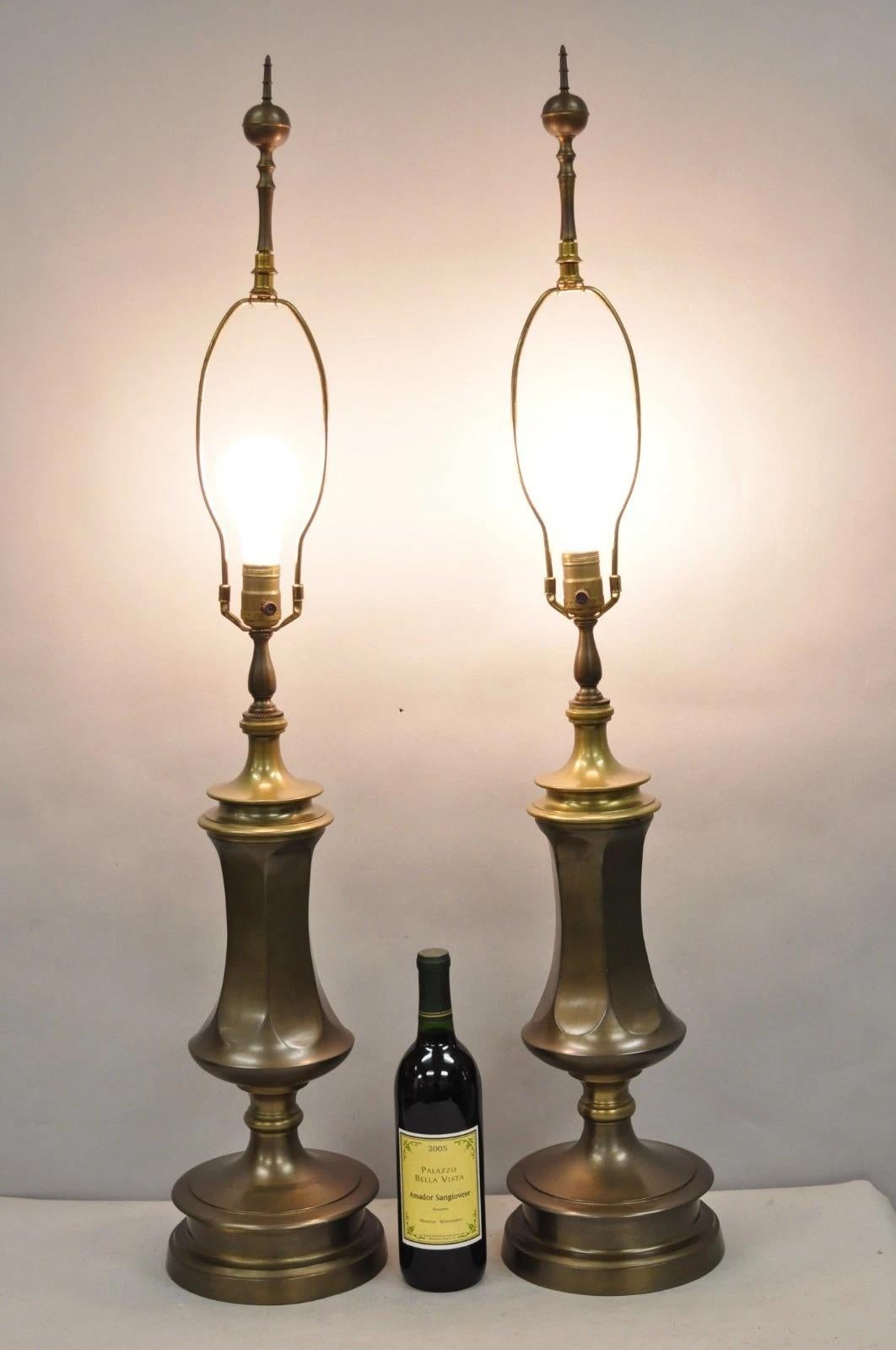 Vintage French Empire Style Patinated Bronze/Brass Heavy Column Table Lamps by Wildwood - a Pair. Circa Late 20th Century. Measurements: 41