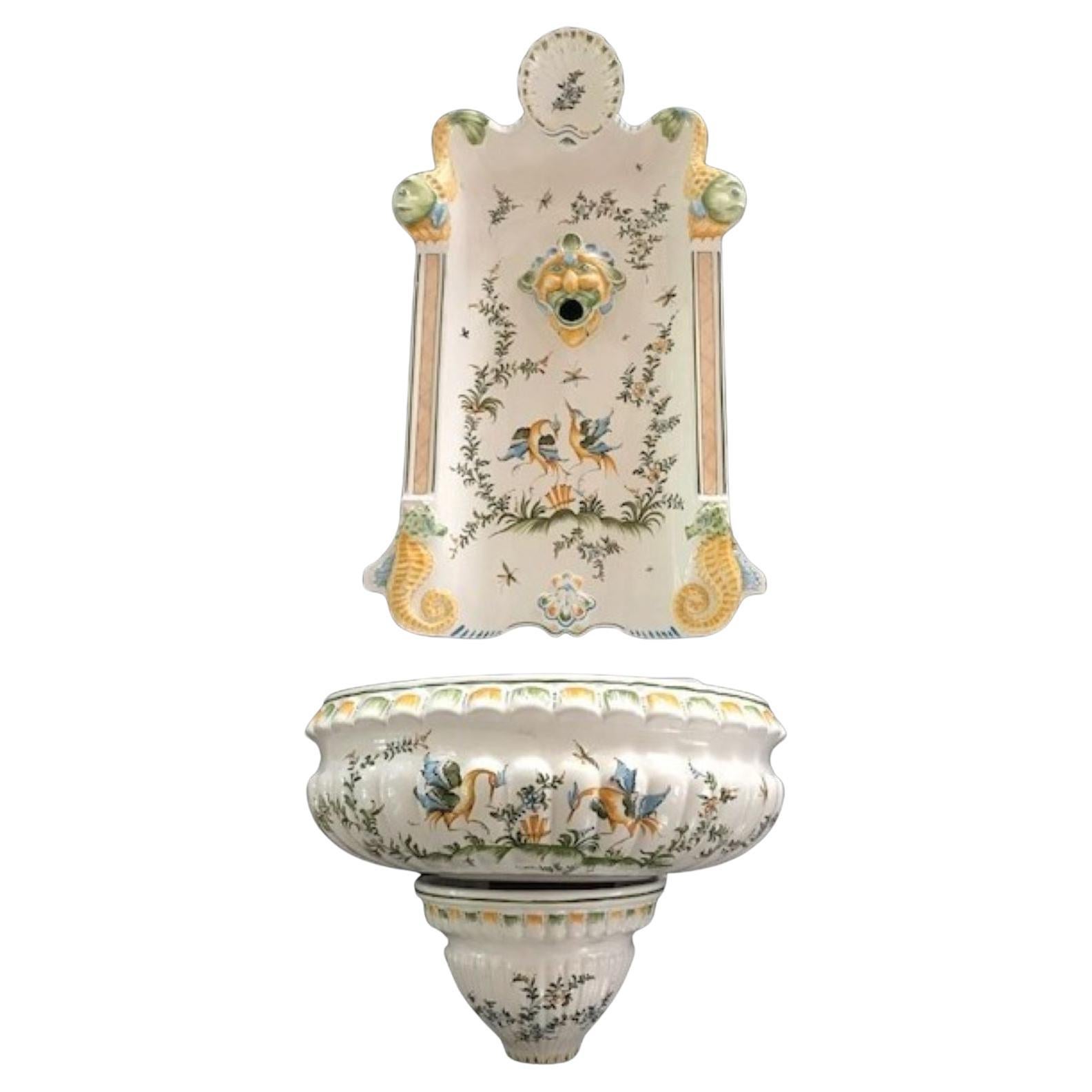 Large Moustiers French faiance wall lavabo hand painted and signed.

Measures: Backsplash is approximately 23 in. L. x 14 in. W.
Basin is approximately 7 in. H. x 15 in. W. x 11 in. D


This piece came from the Estate of Linda McRae Noe Laine.