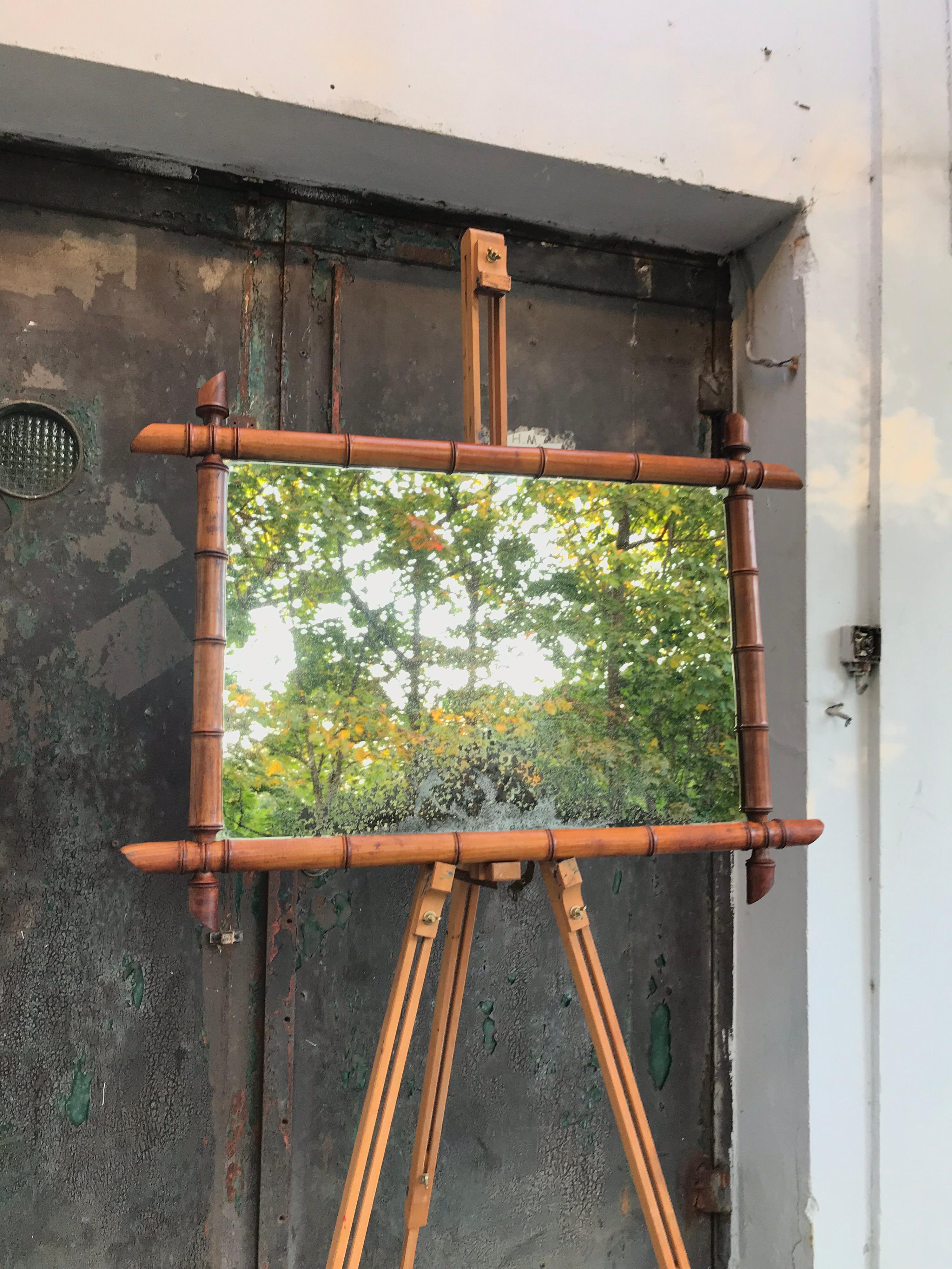 Vintage French faux bamboo mirror of a very good quality
Made from turned fruitwood
Very attractive patina to the glass plate and also the faux bamboo frame
So much more than just a mirror
Also a piece of stunning wall art.
 