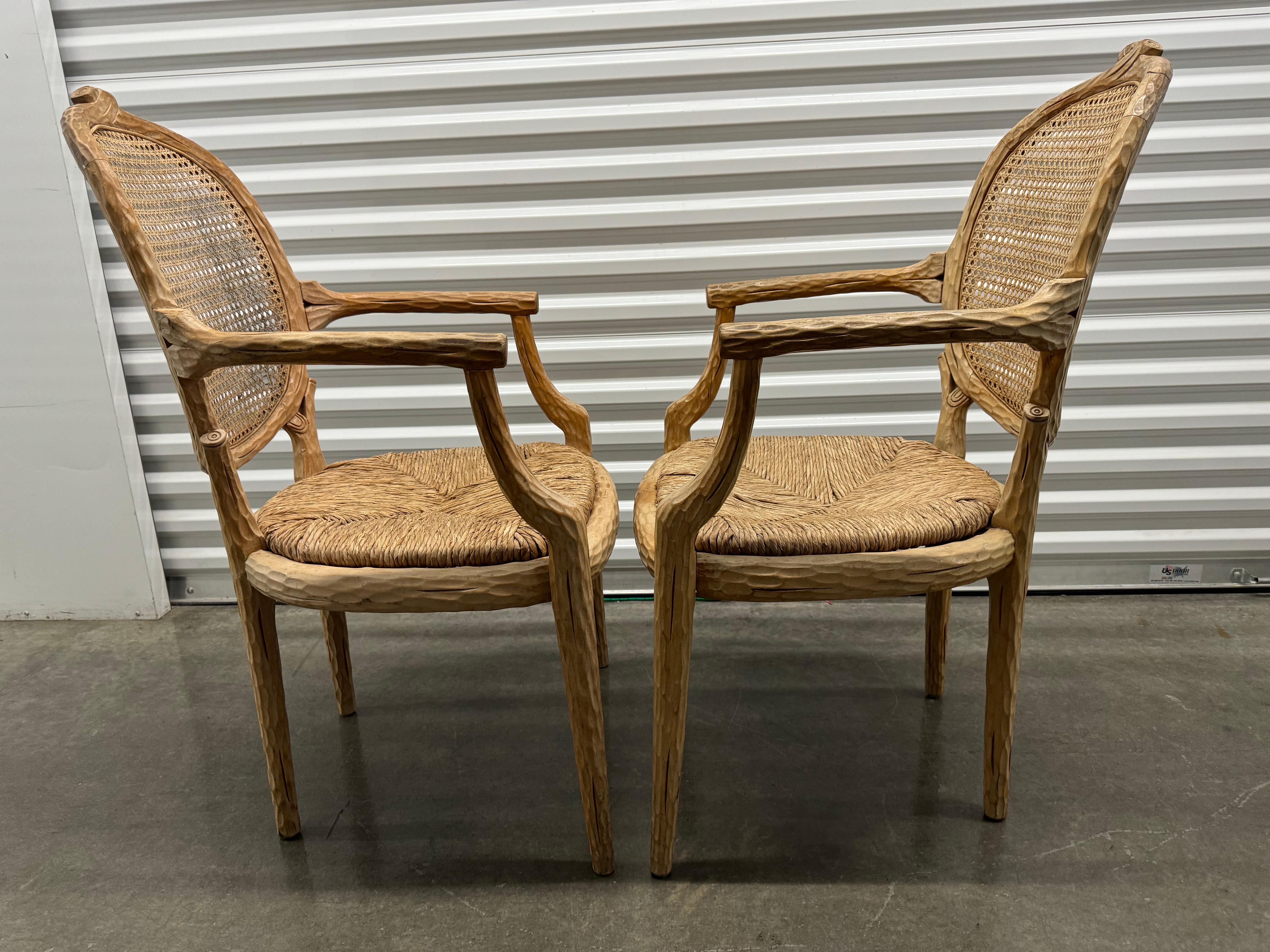 For Sale: Elegant Beech Side Chairs with Faux Bois Motif

Enhance your home decor with a stunning pair of beech side chairs featuring a beautifully carved faux bois or twig motif. These chairs showcase a caned back and rush seating, exuding a