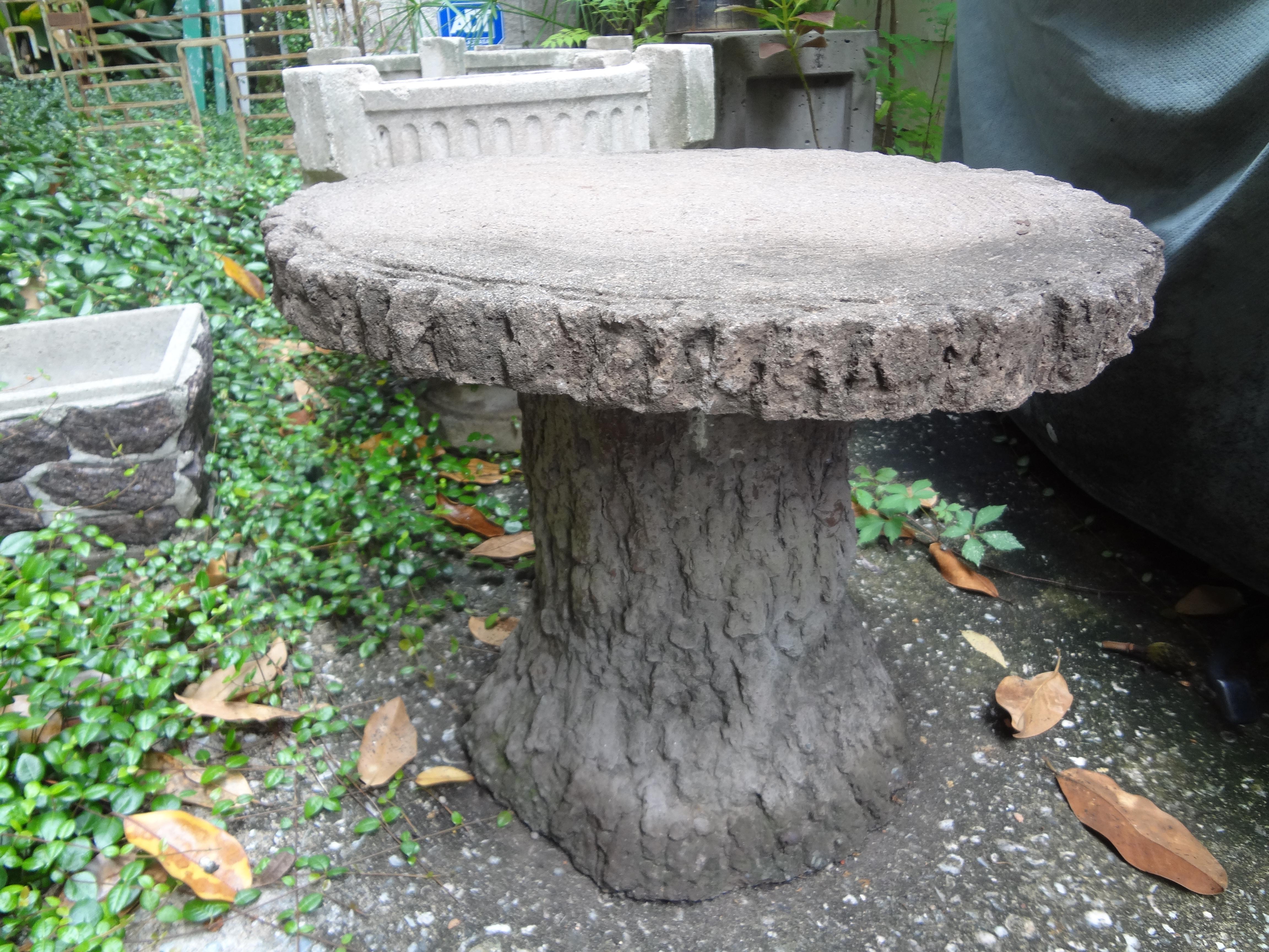 Interesting vintage French faux bois garden table or garden stool. This beautifully sculpted table has an organic modern look to it with the appearance of real tree bark. This great faux bois table would work equally well outdoors as garden accent