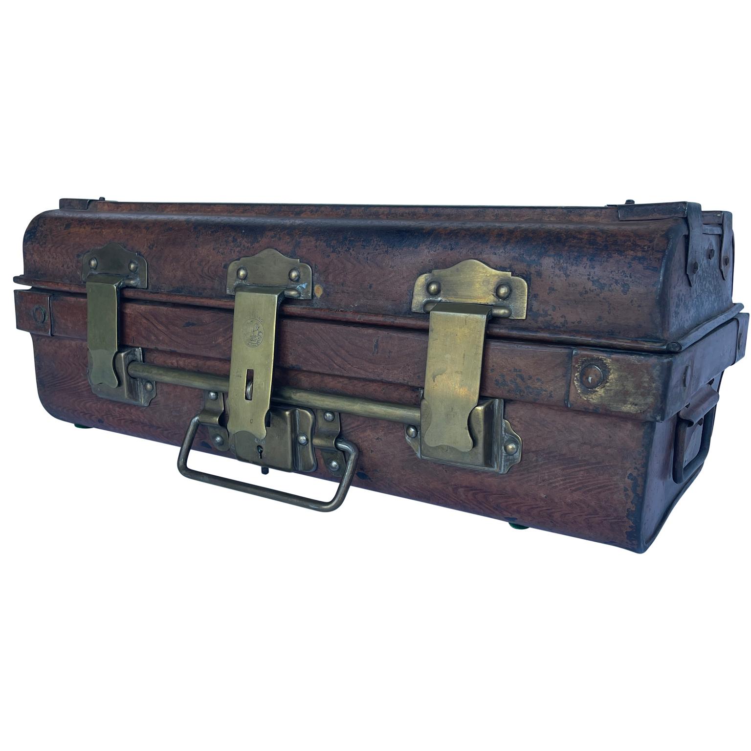 French tole faux bois metal box. 
This sturdy box, with all original vintage brass hardware and original interior marking Sterling label, is functional and beautiful. Large enough to be used as a treasure box or jewelry box or collectible box. In