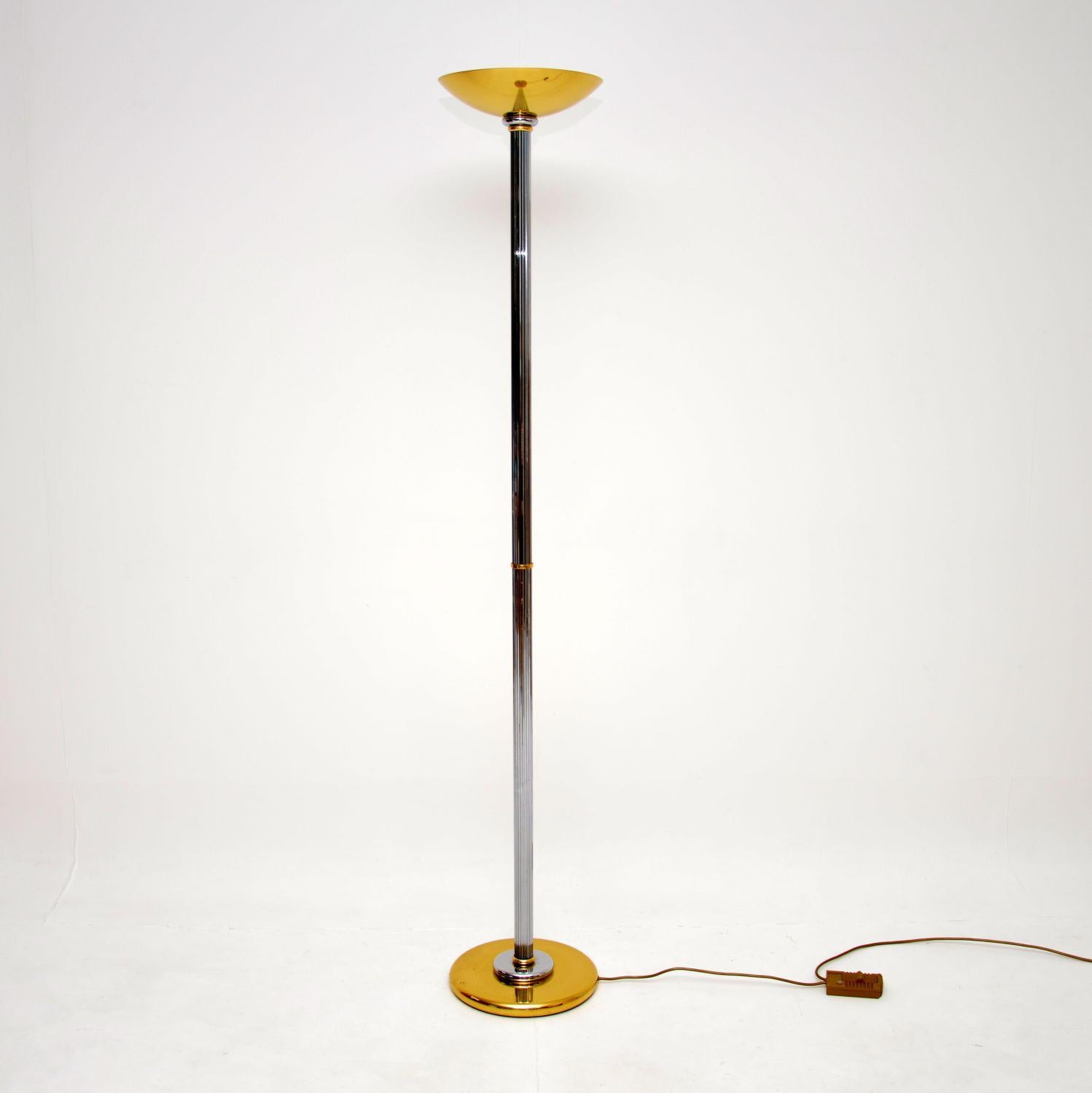 A fantastic vintage French floor lamp by Le Dauphin, dating from the 1970’s.

This is of superb quality, the shade and the base are brass, the fluted column is chromed steel.

This is in excellent condition for its age, with only some extremely