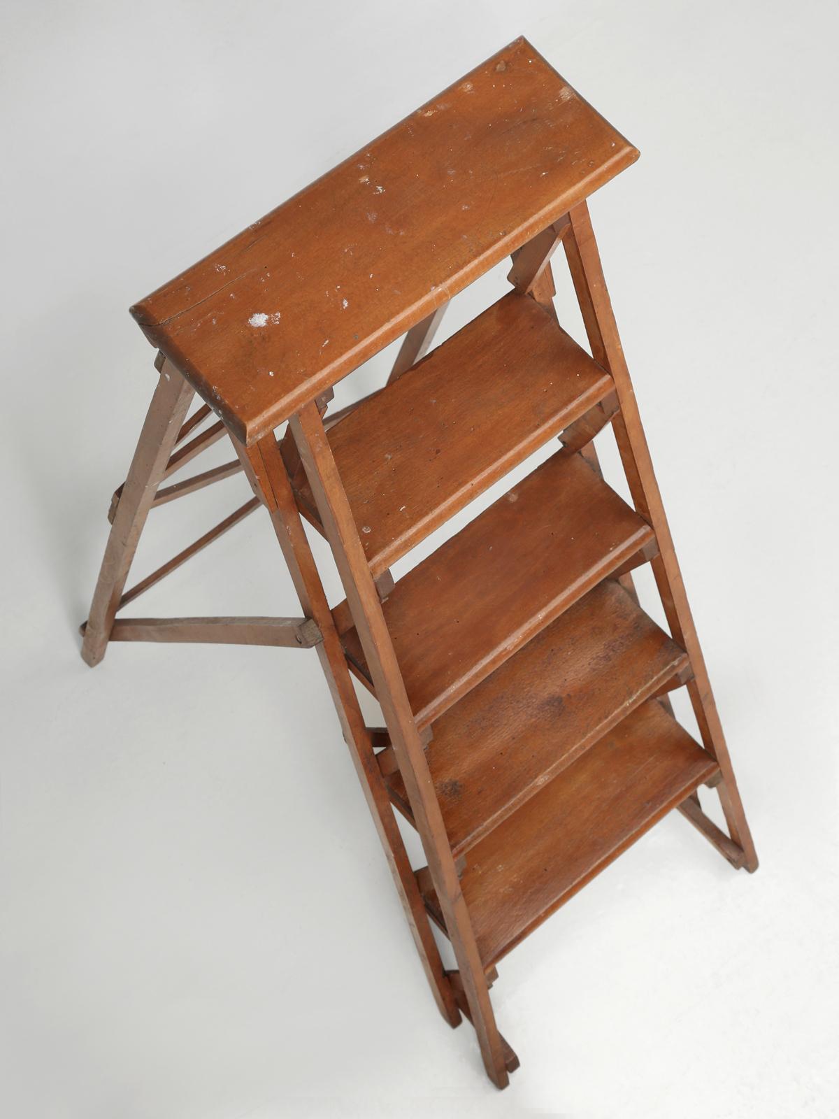 Vintage French folding wooden ladder that one could use to display small rugs or towels? All original finish.
Retains original patina with paint drips and all. Please note that the bottom is missing a piece, best seen in images 14 & 18.
The depth of