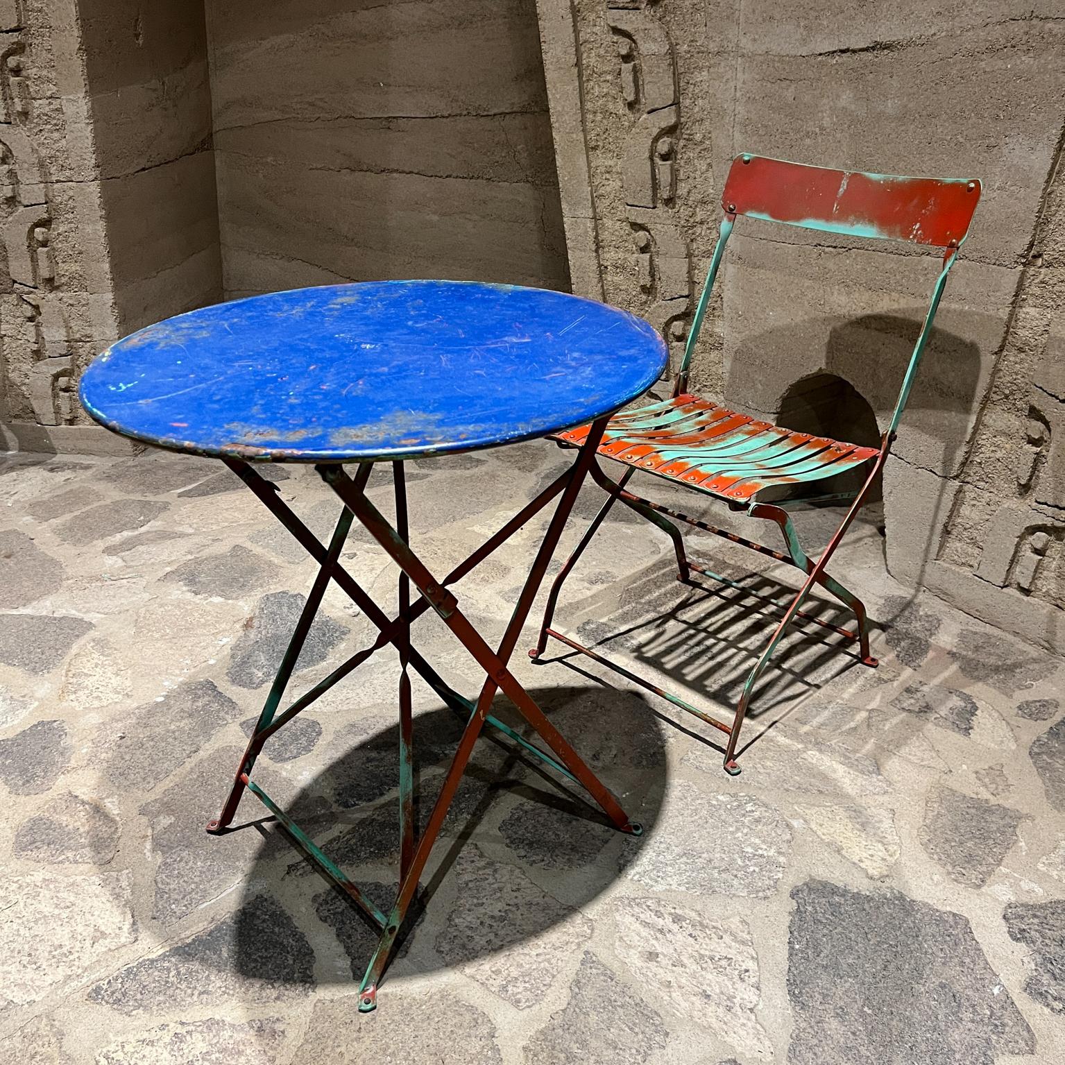 For your consideration, Vintage French Metal Folding Garden Patio Bistro Table and Chair Set
Dimensions: Table 28.75 h x 25.75 diameter, Chair 32 h x 16.5 w x 21 d. Seat 18 h
Preowned unrestored vintage
Refer to images.

Delivery within 200 miles