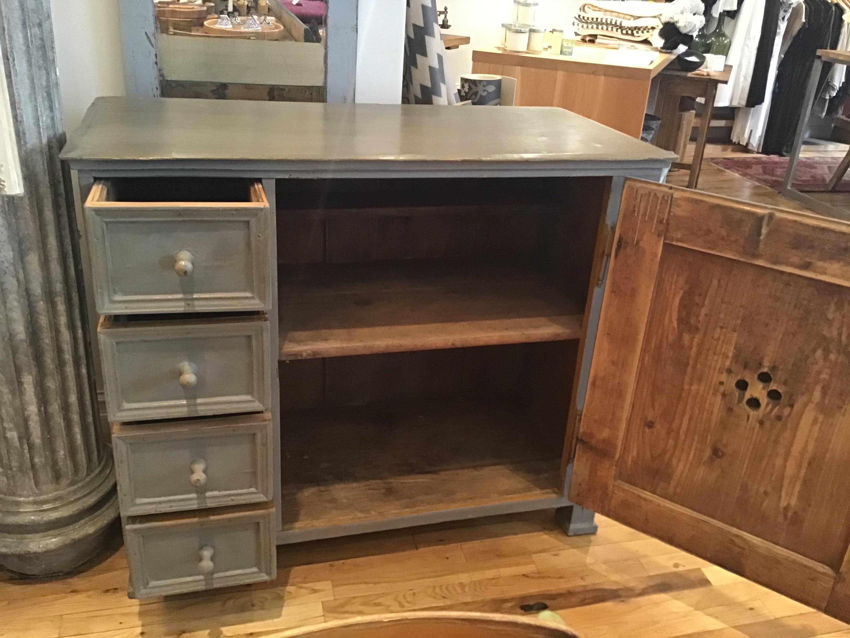 Blueish grey painted vintage French gentleman's chest. Perfect for extra storage in a bedroom or study. With four drawers and one expansive cabinet containing a shelf and sub-shelf. Small enough to fit in limited spaces, large enough for multiple