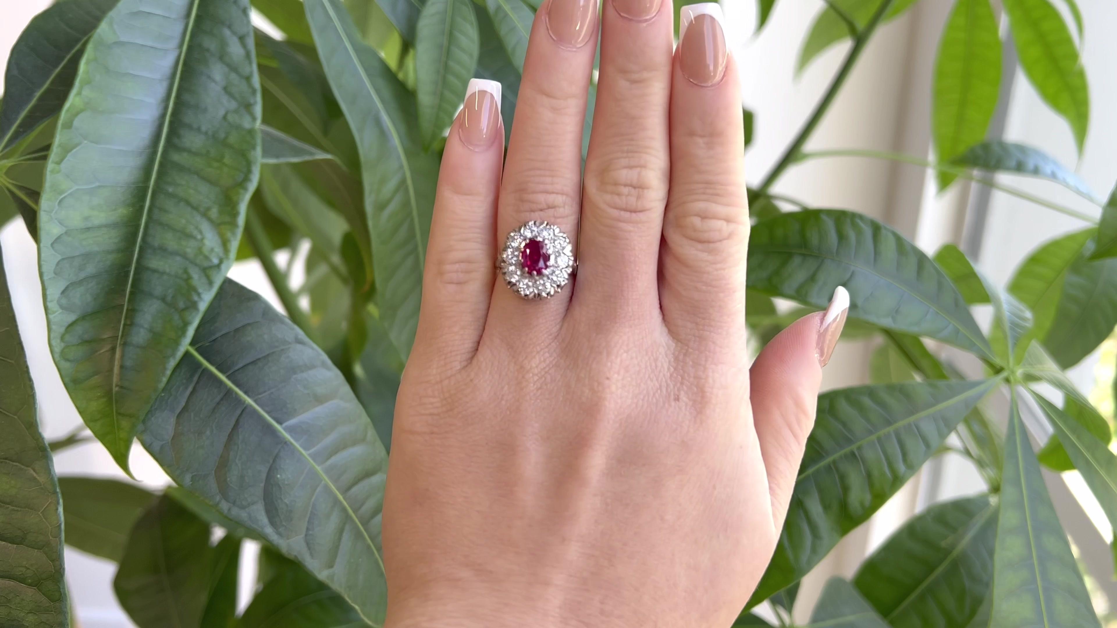 One Vintage French GIA No Heat Burma Ruby Diamond Platinum Ring. Featuring one GIA certified oval shaped ruby of approximately 1.39 carats, accompanied with certificate #2225403993 stating the ruby is of Burma origin with no indication of being