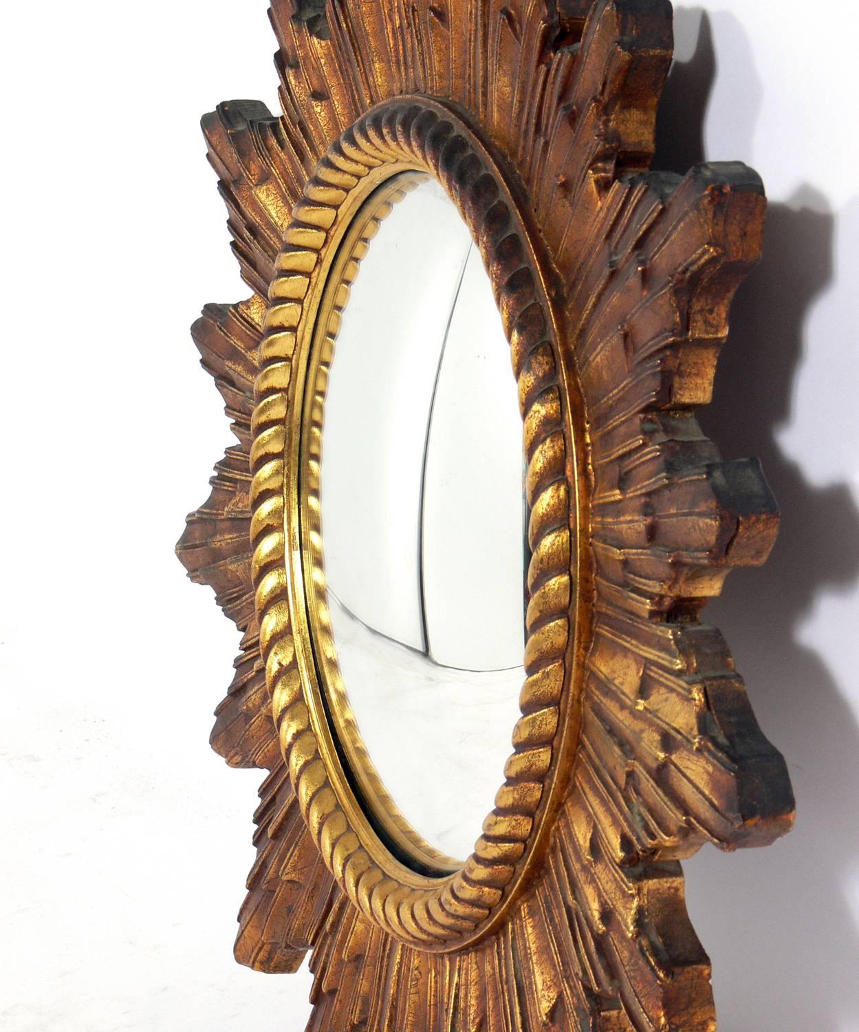 Vintage French gilt convex sunburst mirror, France, circa 1940s. Retains warm original patina to giltwood frame and original mirror. Convex mirrors are always hard to photo, as they often end up looking like flat mirrors, but it is definitely convex!