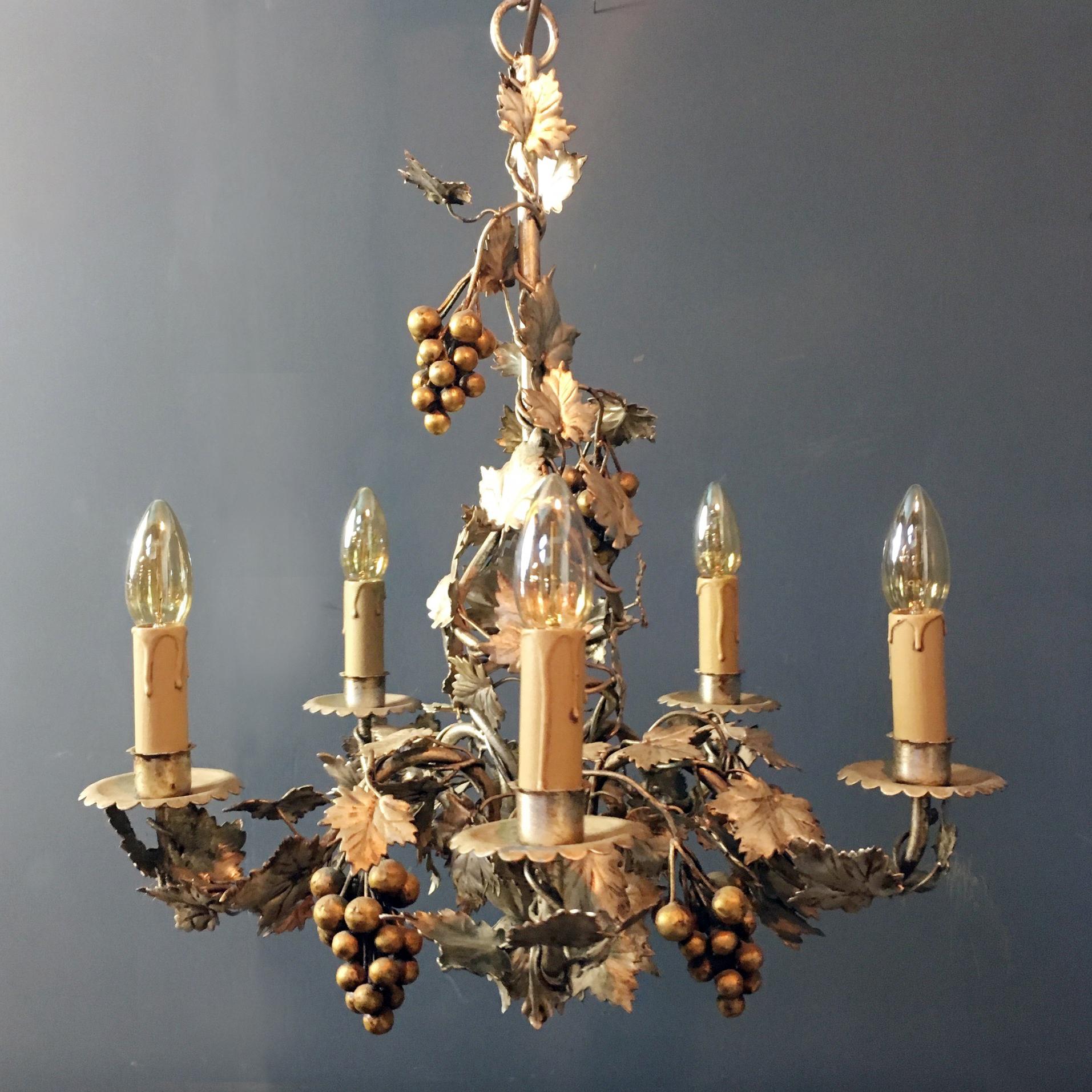 Beautiful french tole light featuring bunches of gold grapes placed among silver grape vines and leaves.

This is a rare tole light as silver is unusual, the silver is very pale and soft in color with the gold, beautiful.

This is a vintage