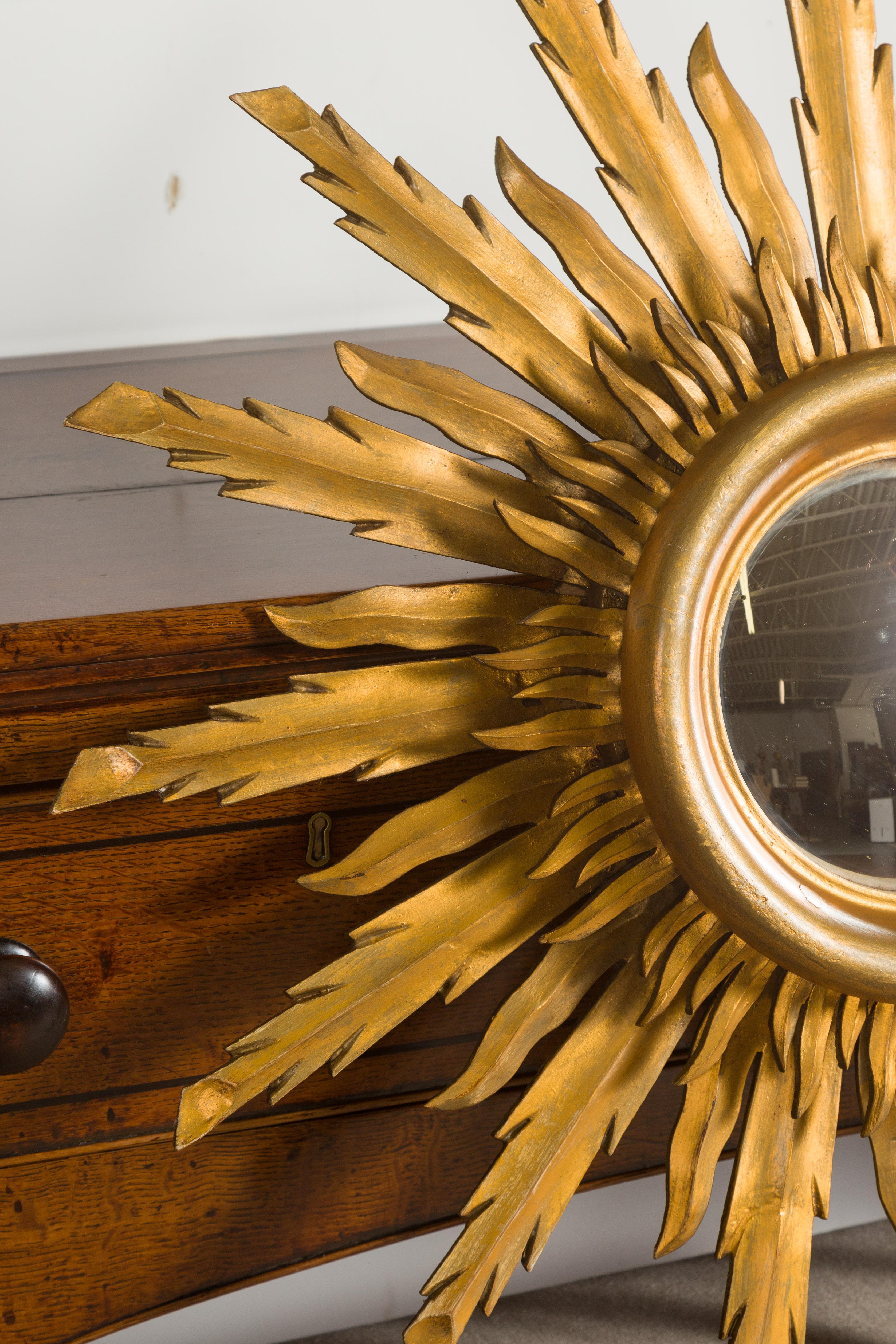 20th Century Vintage French Giltwood Midcentury Convex Sunburst Mirror with Wavy Rays