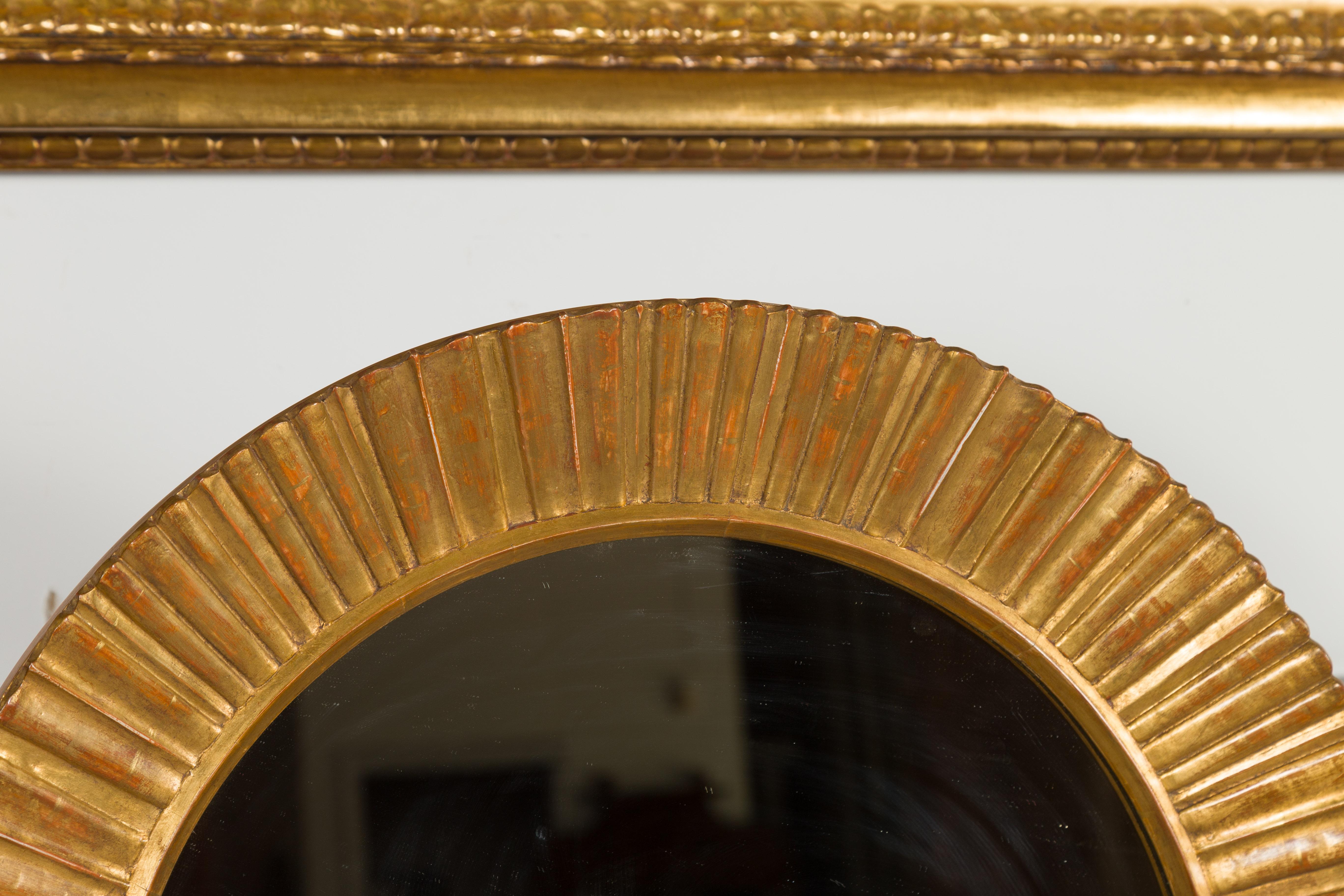 Carved Vintage French Giltwood Midcentury Sunburst Mirror with Radiating Motifs For Sale