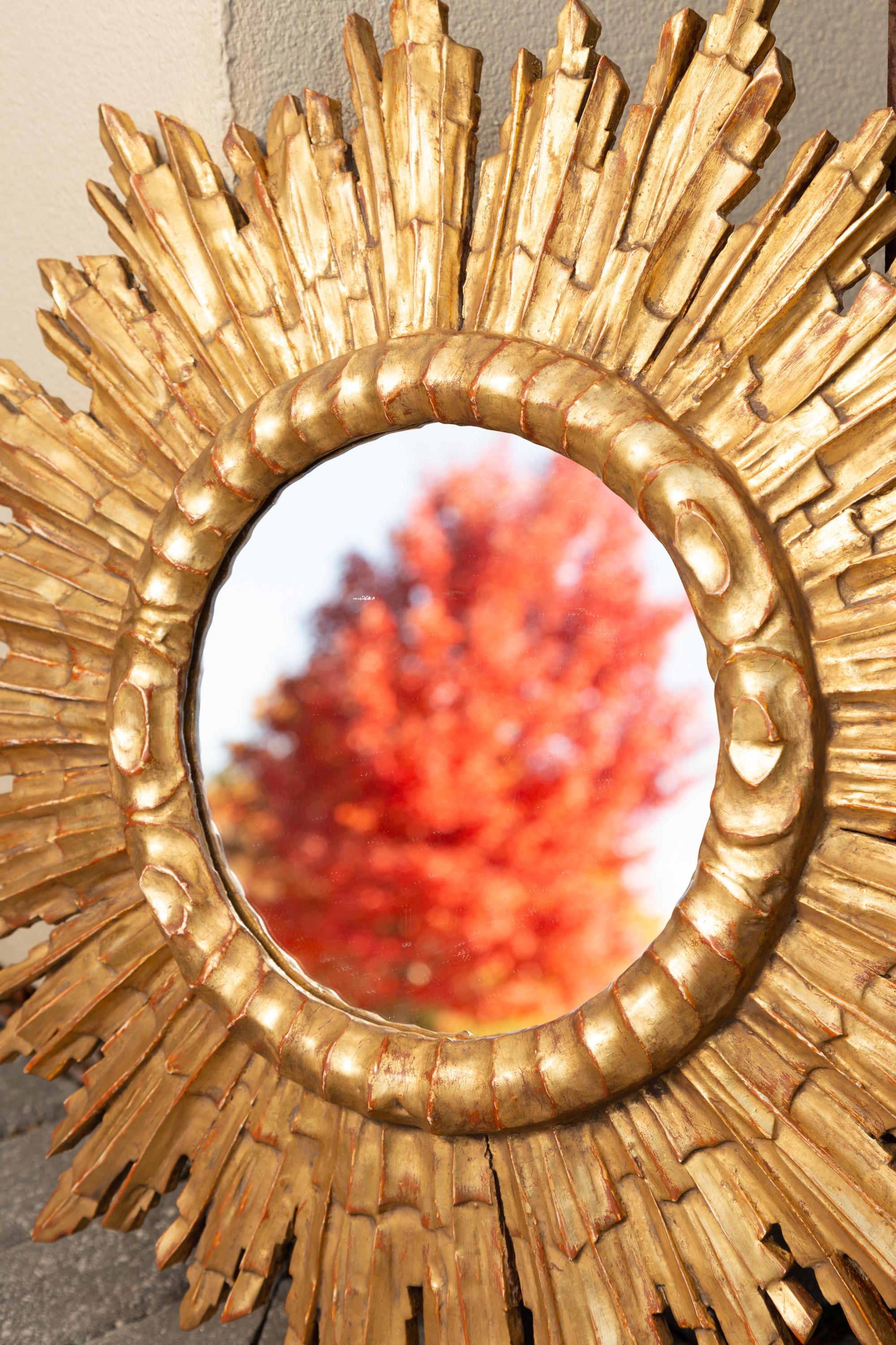 Carved Vintage French Giltwood Sunburst Mirror with Cloudy Frame, circa 1950
