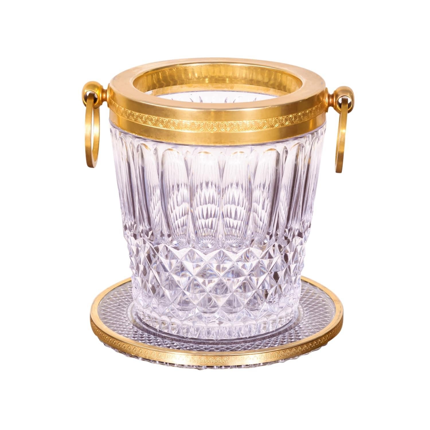 Beautiful vintage French cut glass champagne ice bucket with etched brass rim and ring handles having a matching cut glass and brass tray to keep splatters and water off the table, circa 1930s. Use yours to hold ice for a party or a lovely flower