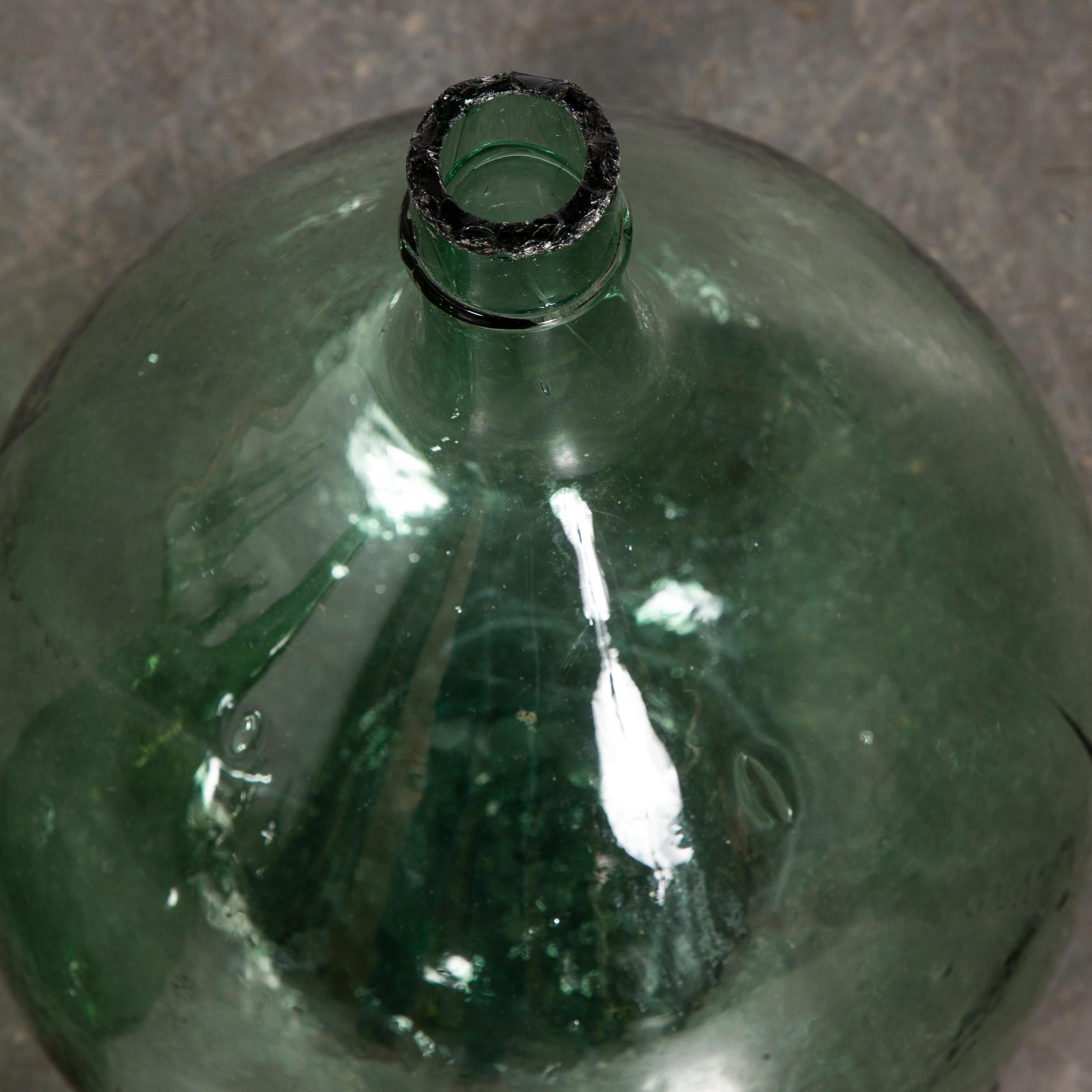 Vintage French Glass Demijohn – Pair of Demijohn (Model 957.7)
Vintage French Glass Demijohns. Pair of mouthblown glass demijohns used as a traditional containers mainly for wine storage and transport. Our demijohns have been carefully cleaned.