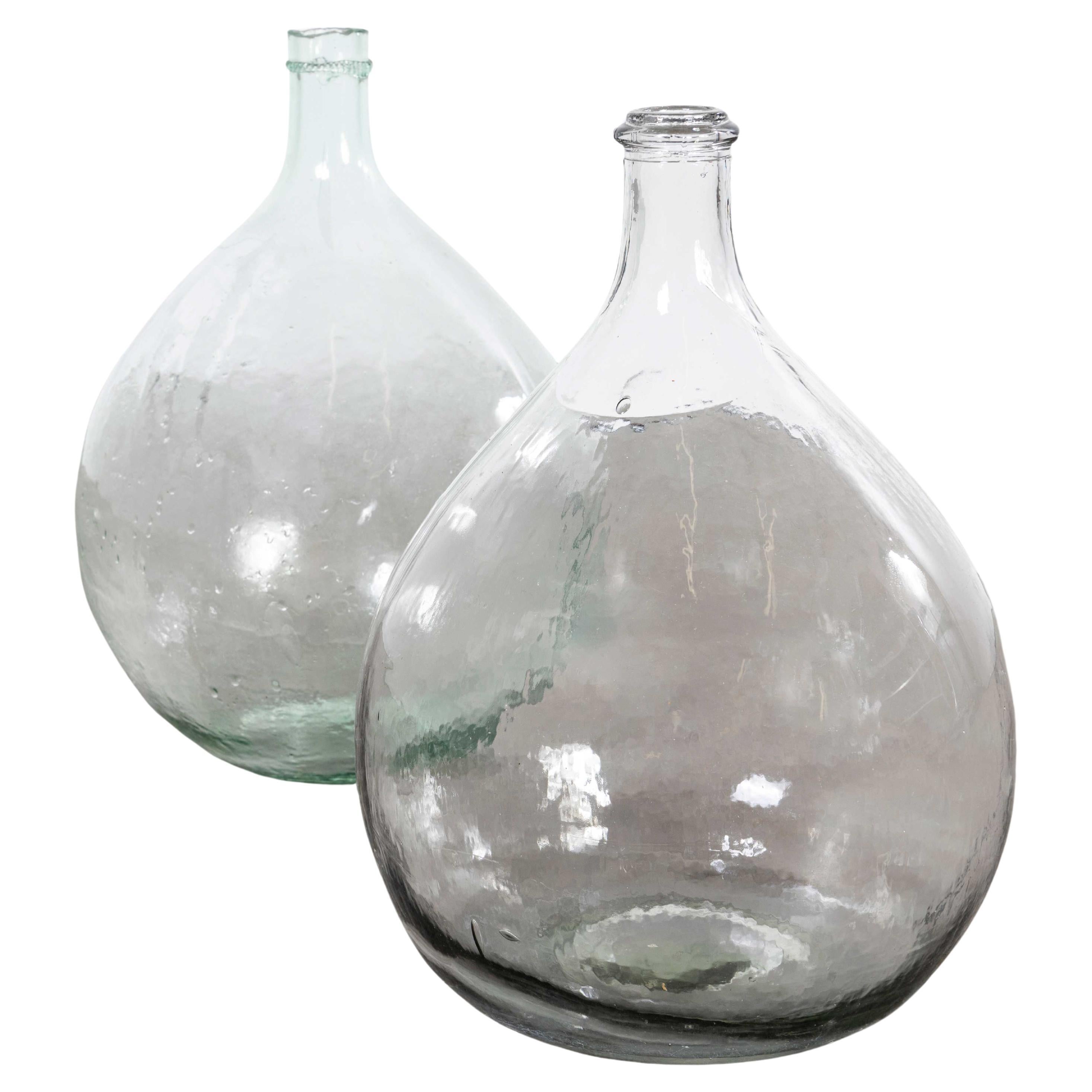 Vintage French Glass Demijohns - Pair (957.22) For Sale