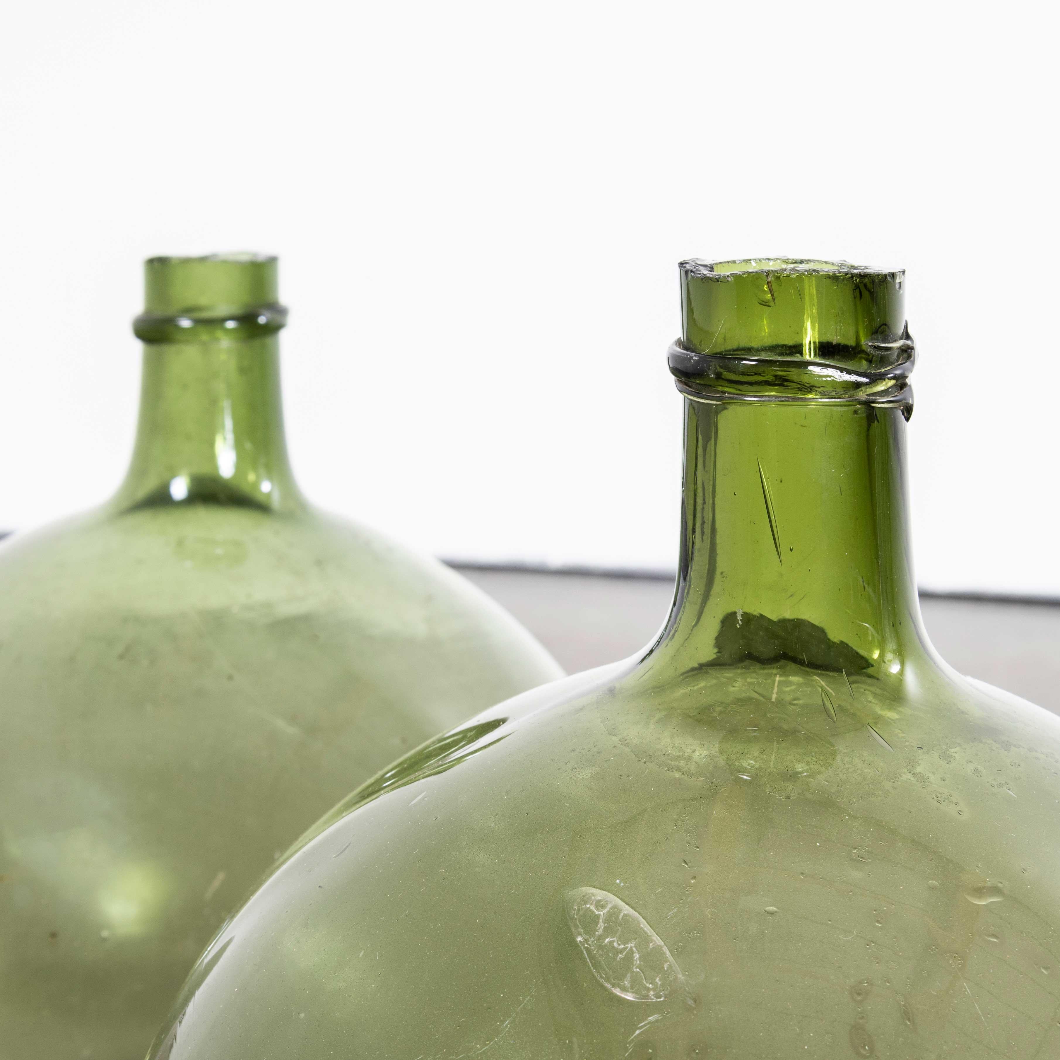 Vintage French Glass Demijohns – Pair (957.24)
Vintage French Glass Demijohns – Pair. A pair of mouth blown glass demijohns used as a traditional containers mainly for wine storage and transport. These demijohns have been carefully cleaned.