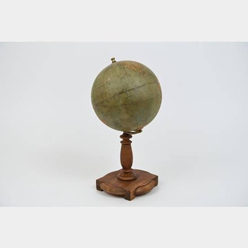 Vintage French globe with wooden stand.