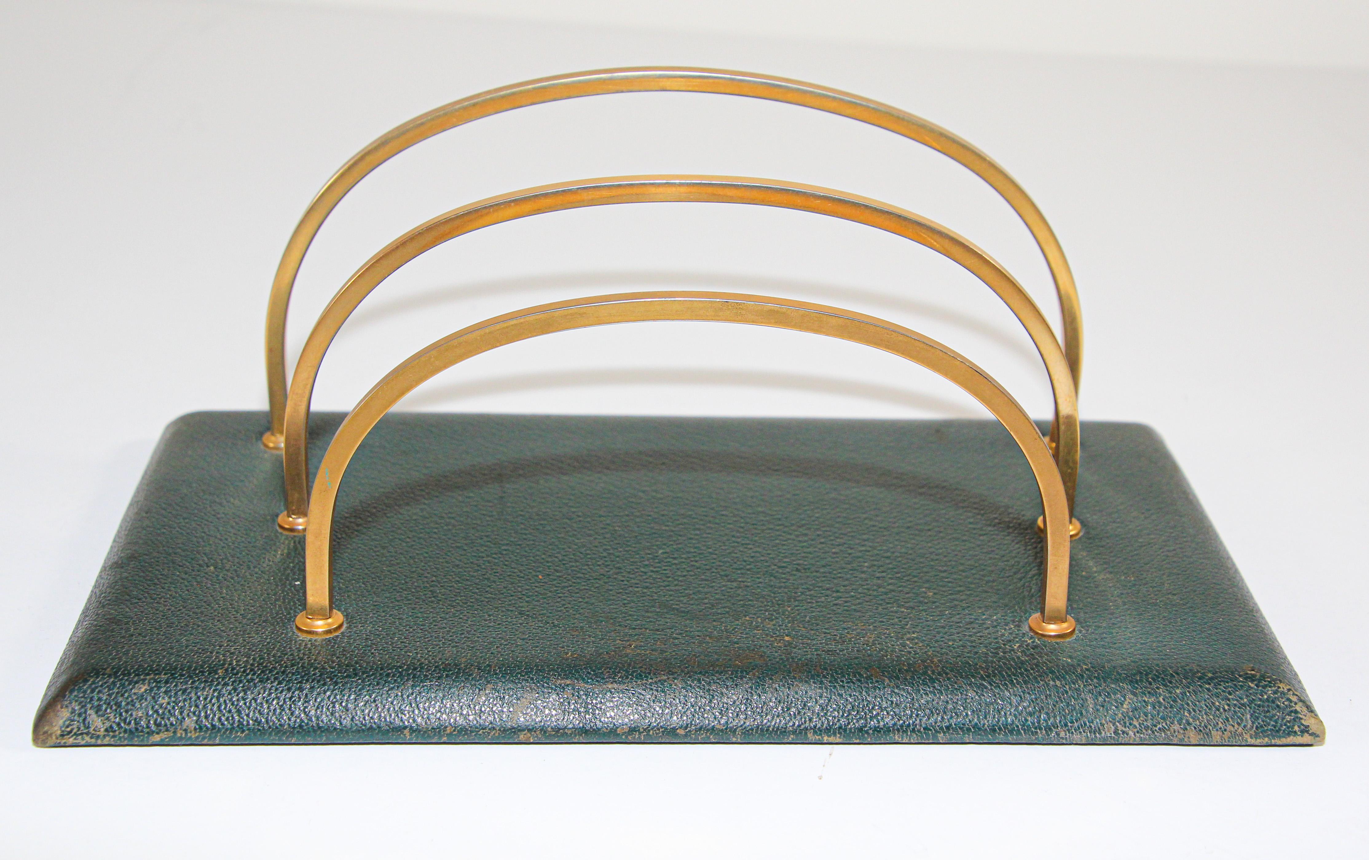 Adnet Art Deco style green leather and brass letter rack holder.
The leather rack is handcrafted and exquisitely executed using brass elements which gives the rack a luxury finish.
The leather is in great vintage condition in the style of Jacques