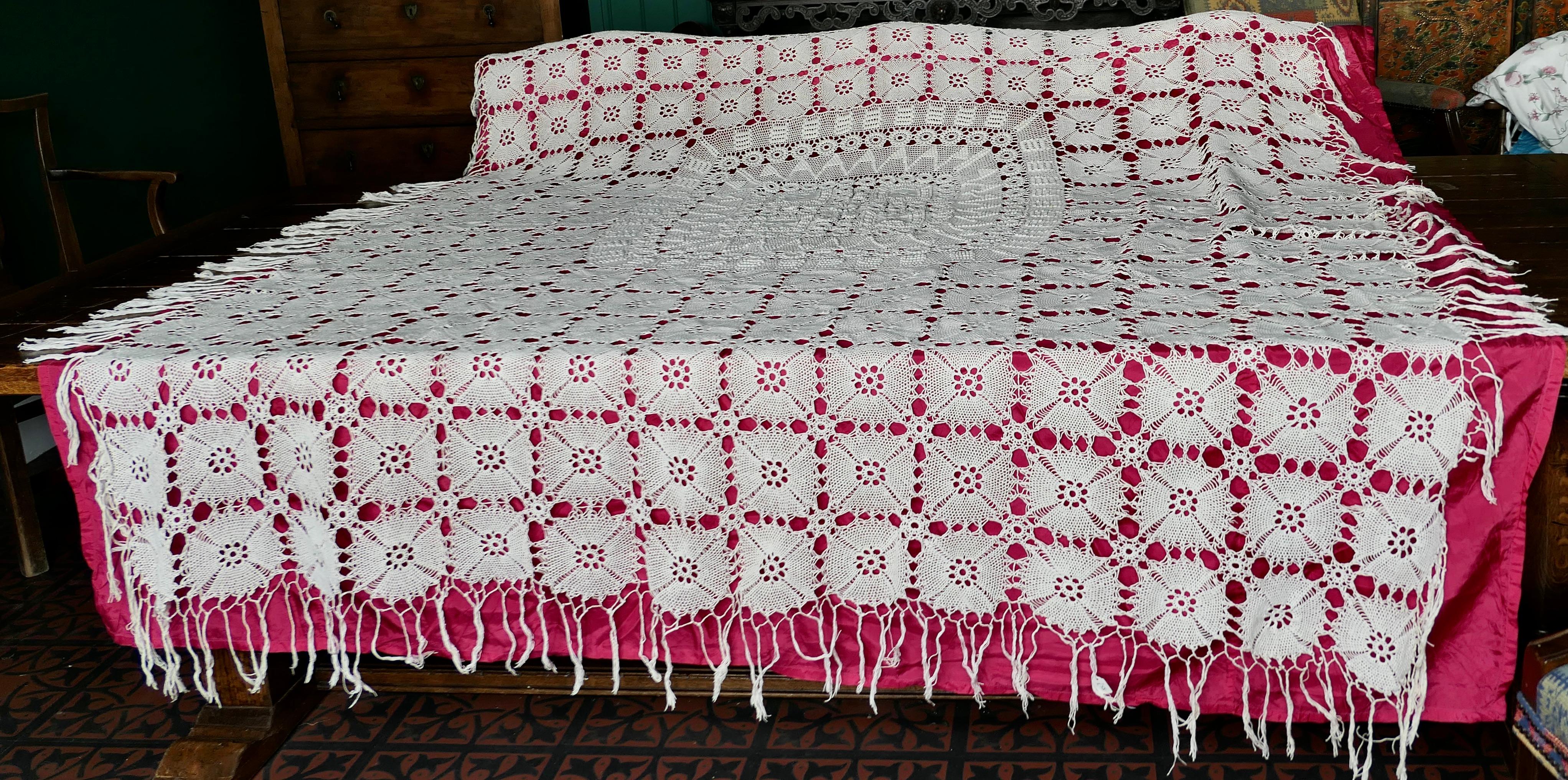 Vintage French heavy hand crochet bed cover or table cloth.
This is a beautiful hand made piece, it is made in cotton it is in very good condition and has never been used it has just been displayed on a double bed, it is 74” x 87” including the