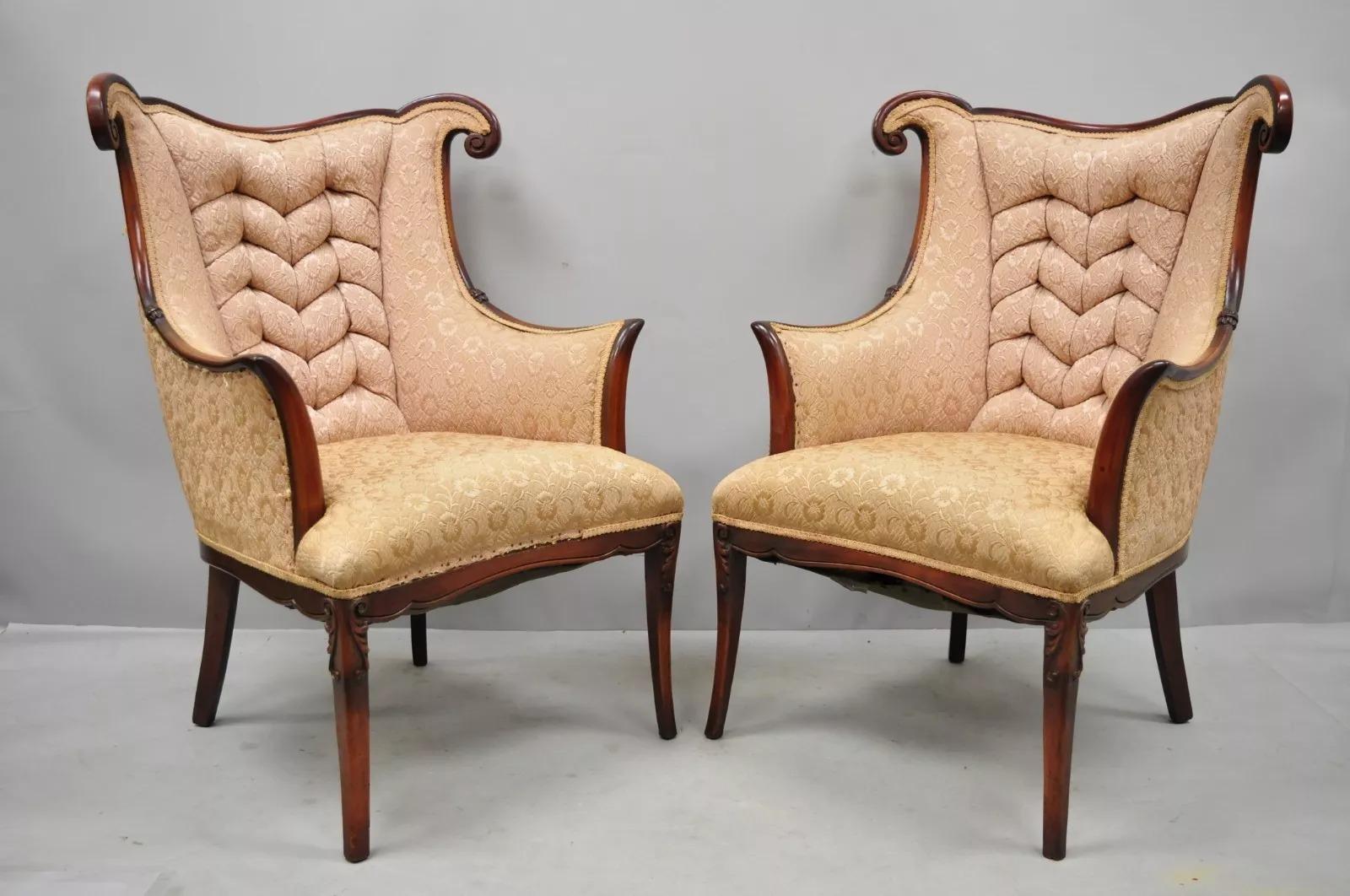 Vintage French Hollywood Regency Art Deco Style Mahogany Arm Chairs - a Pair. Item features solid wood construction, nicely carved details, tapered legs, sleek sculptural form. Circa Early 20th Century. Measurements: 41