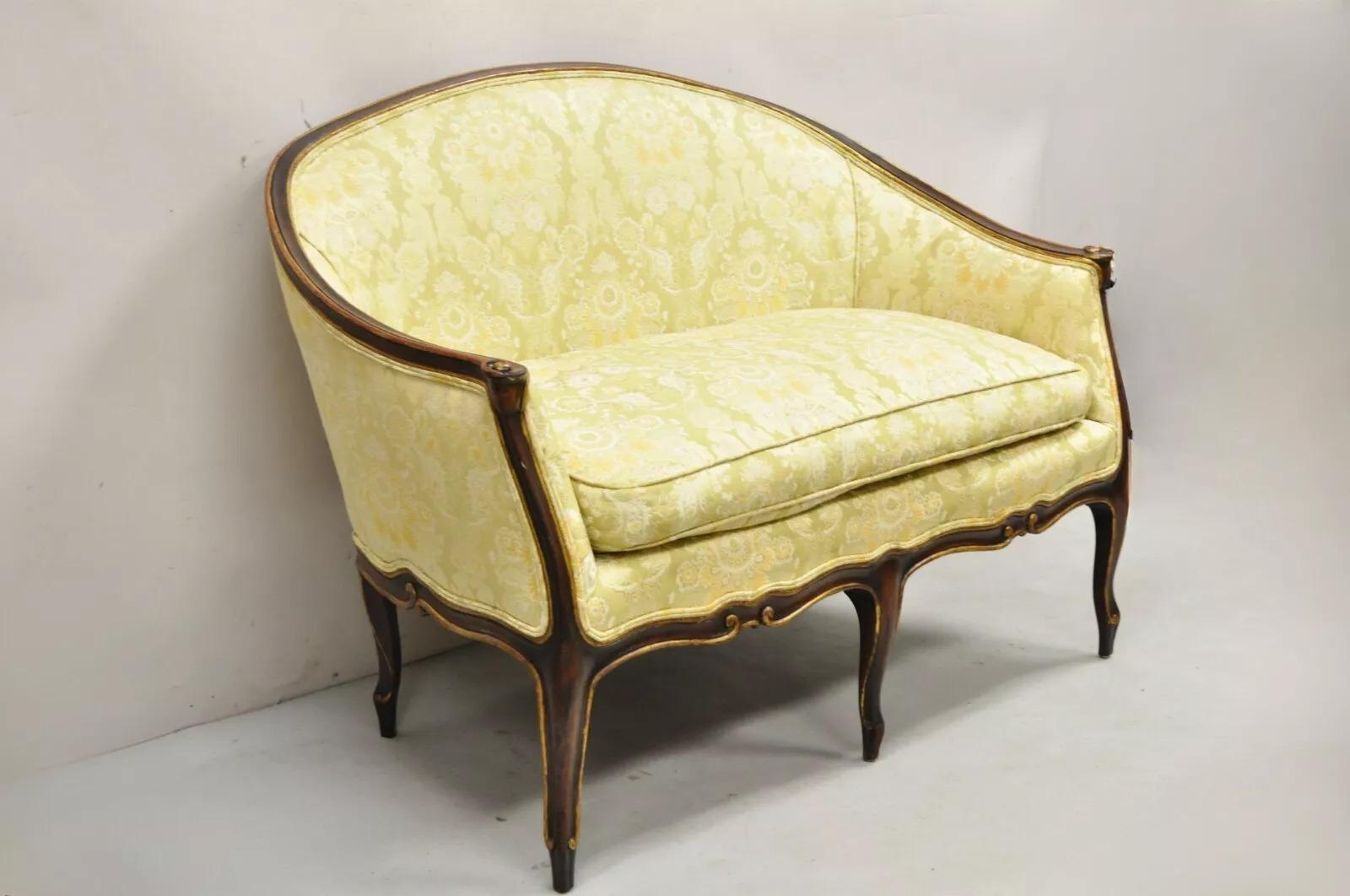 Vintage French Hollywood Regency Curved Frame Barrel Back Loveseat Sofa. Item features a distressed finish, shapely cabriole legs, gold accents, beige/gold upholstery, very nice vintage item. Circa Mid 20th Century. Measurements: 38