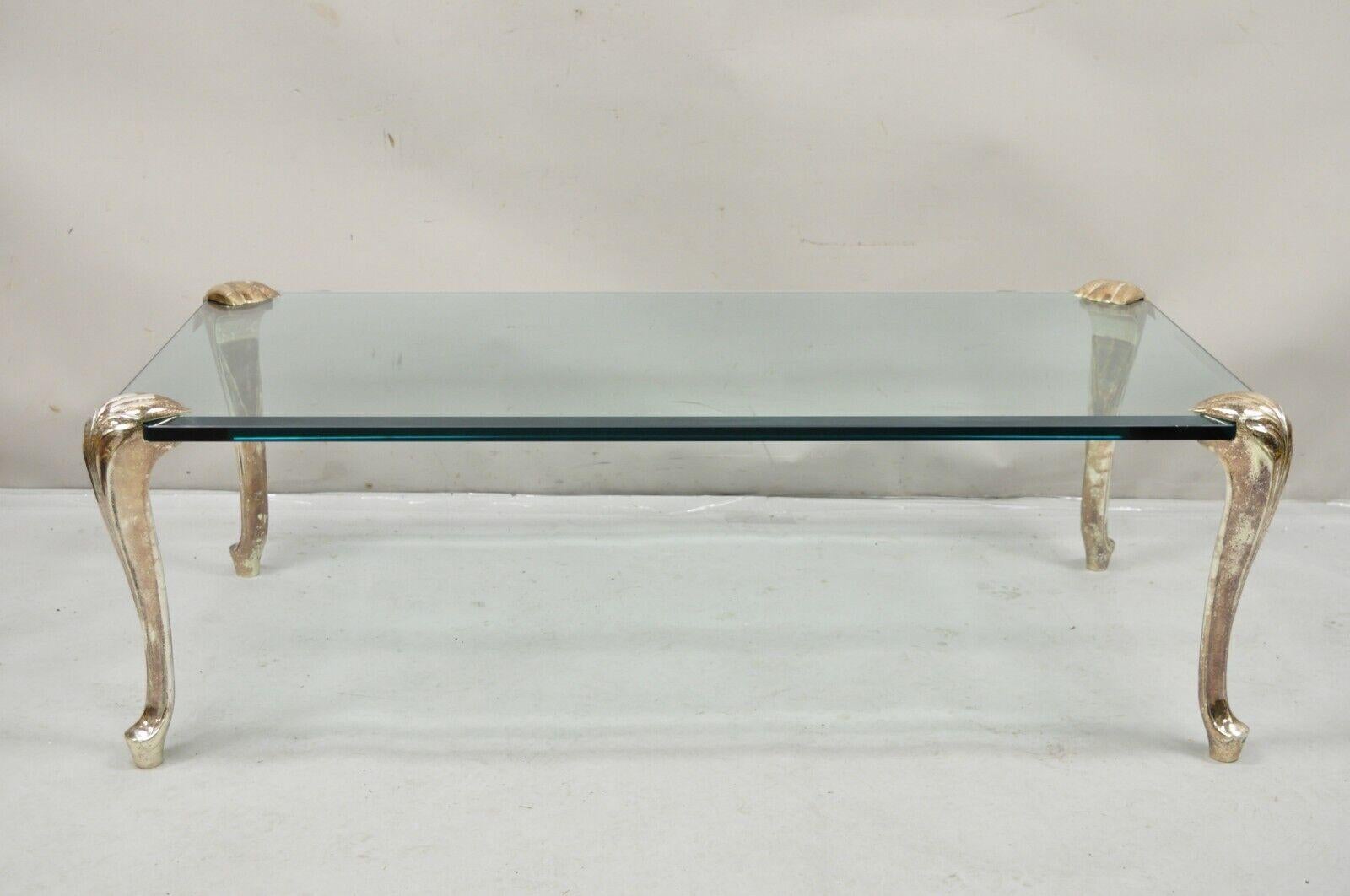 Vintage French Hollywood  Regency Beveled Glass Bronze Cabriole Leg Coffee Table. Item features intentional manufacturer distressed finish to cast bronze cabriole legs, thick beveled clear glass top, high quality craftsmanship, great style and form.