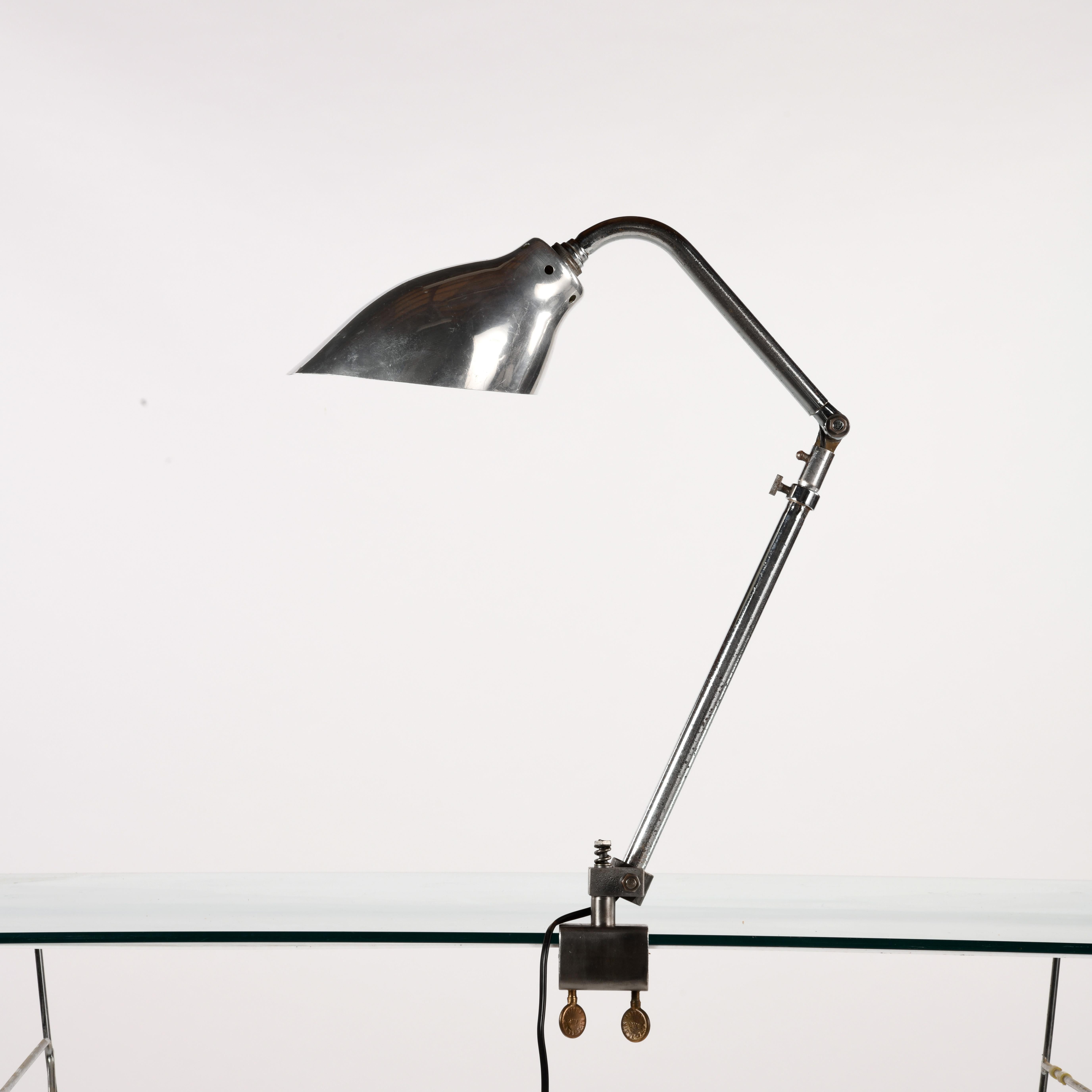 Ki-E-Klair lamp made in the 1960s by Alphonse Pinoit and his son André Pinoit. This model has a vice, swivels in all directions and is telescopic. It is fitted with a truncated cone-shaped aluminium shade, model no. 210 (some signs of use and chrome