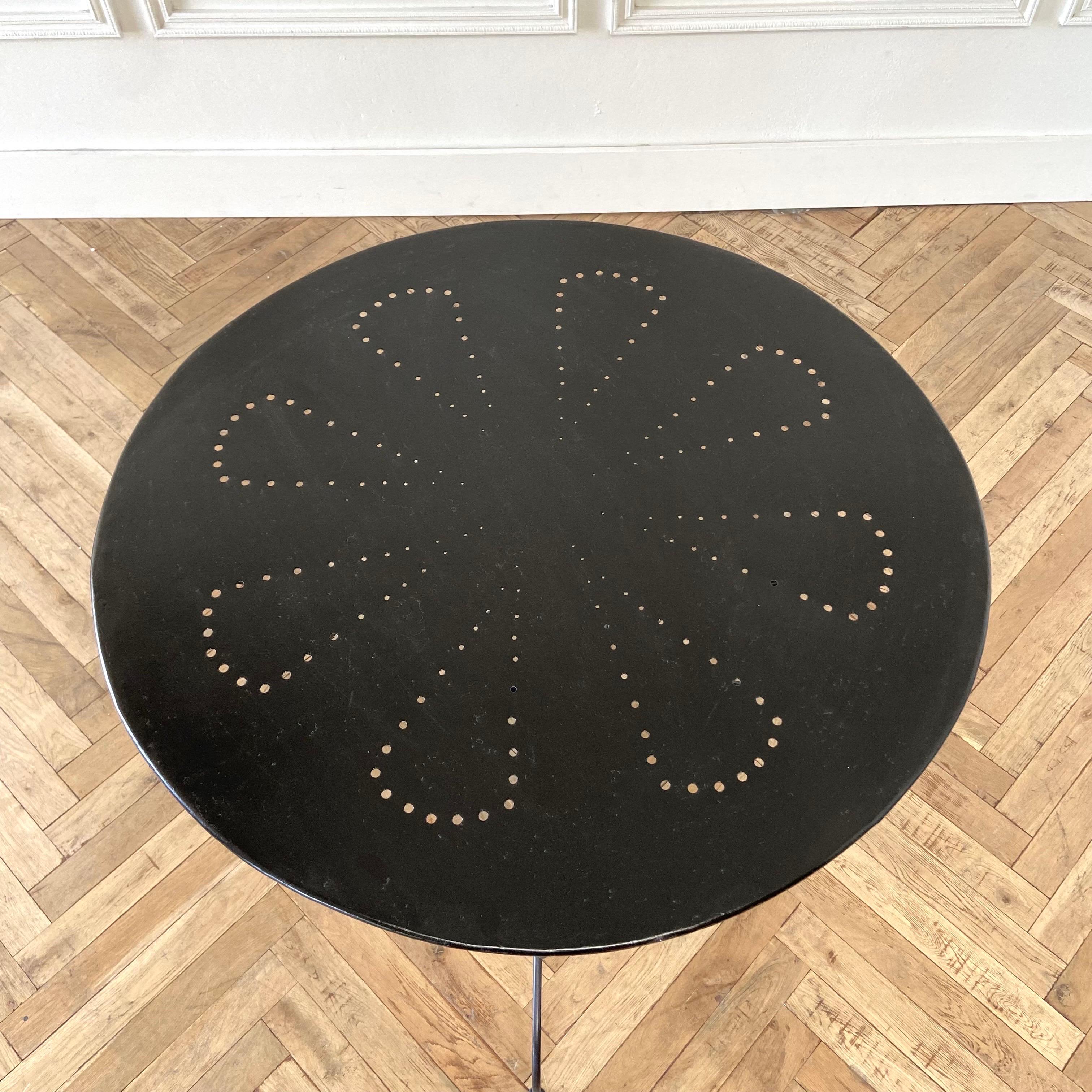 Vintage French Outdoor dining table.
Newer paint in a pure black finish. Signs of subtle original paint still present in the top. Solid and sturdy ready for everyday use.
Size: 46” rd. X 28-1/2”h.