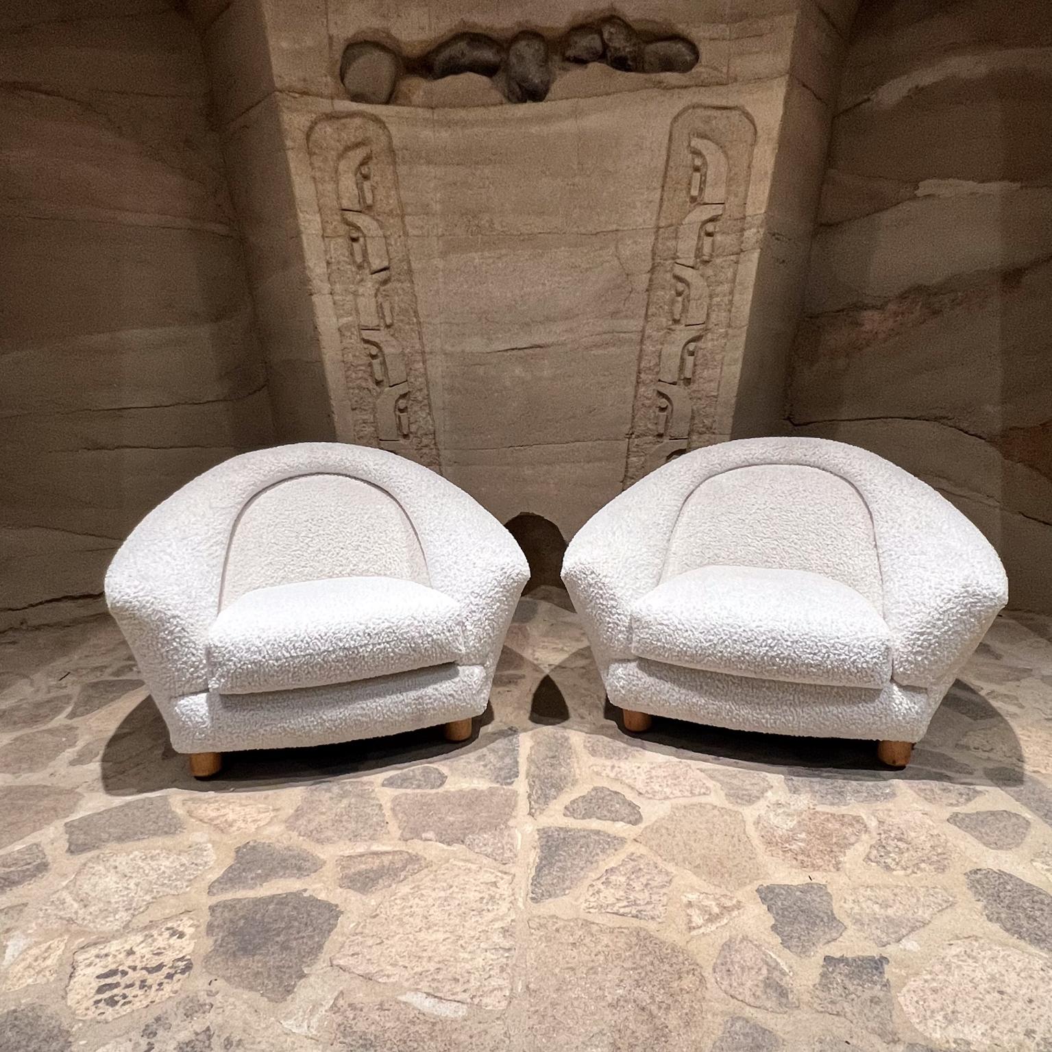 For your consideration, a pair of 1970s fabulous French Style plush Ivory Lounge Chairs 
style polar bear .
Dimensions: 28 h x 41 w x 32 d seat 15
New upholstery textured cozy woven fabric
Original preowned vintage very good condition.
Please review