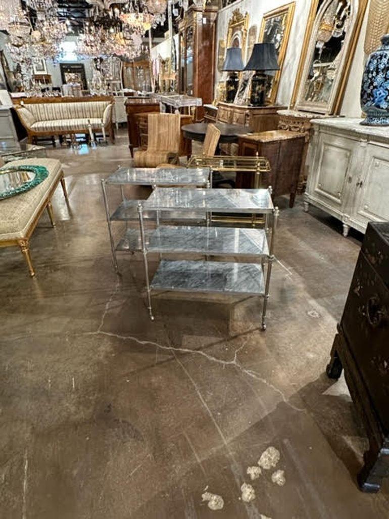 Very fine vintage steel and marble etagere tables. Excellent quality and they create a very sleek look. Stunning!! Note:pricing is per table and there are 2 available.