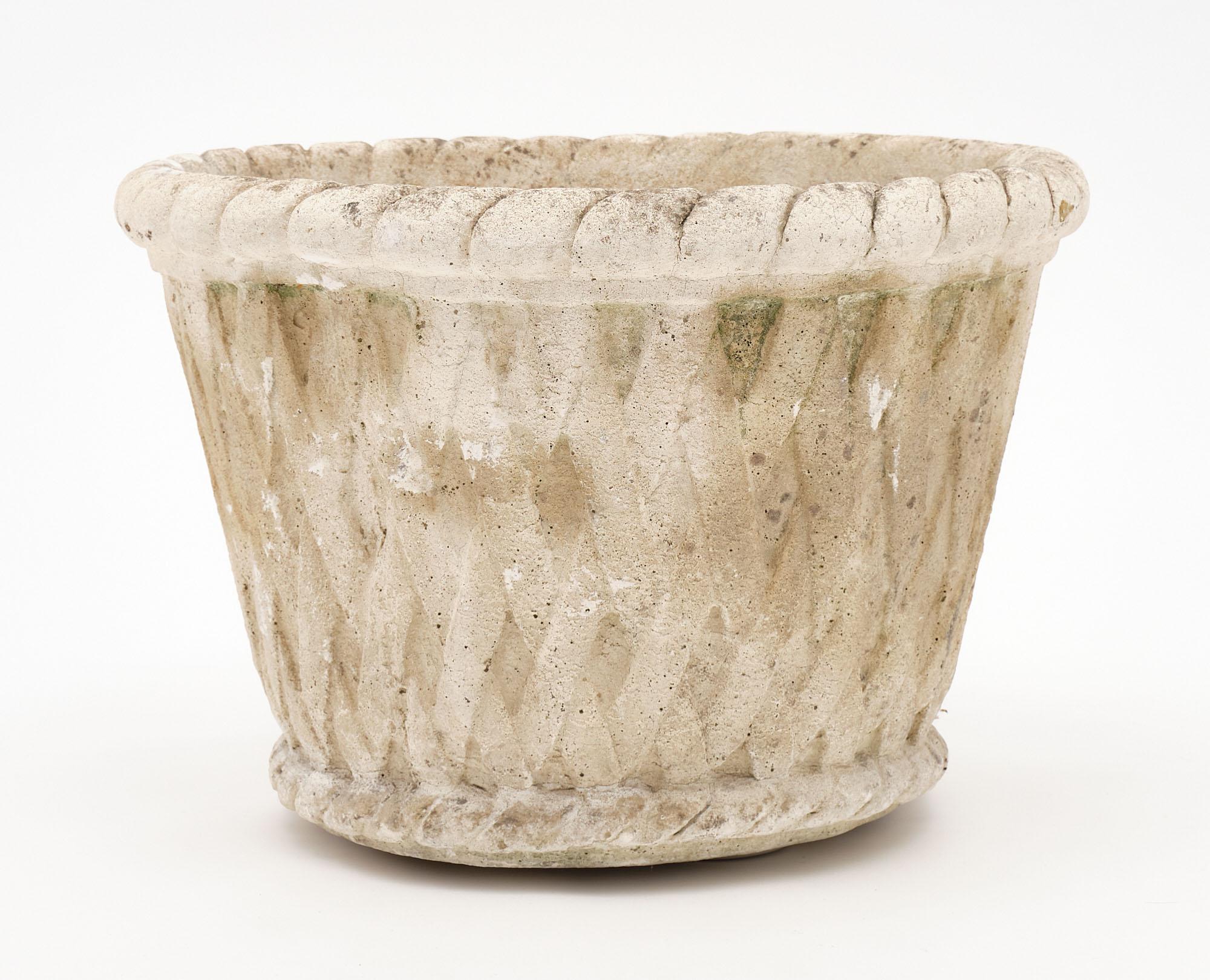 Jardiniere from France made of reconstituted stone.