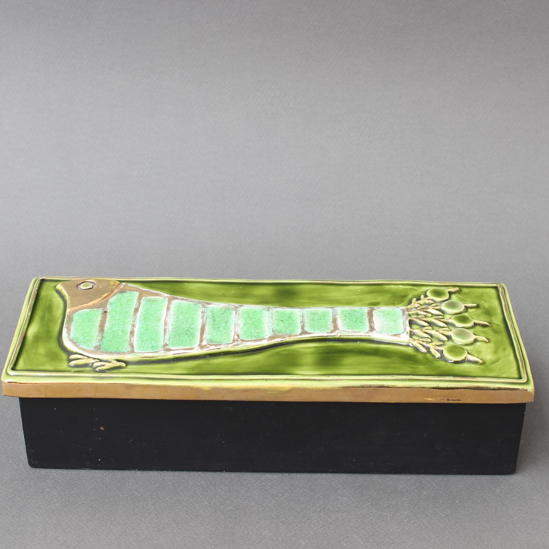 Vintage French jewellery box with decorative ceramic lid by Mithé Espelt (circa 1960s). Raised, stylised bird motif with shades of green both painted and enamelled on the lid, framed and complimented by her trademark gold crackle. The lid tops a