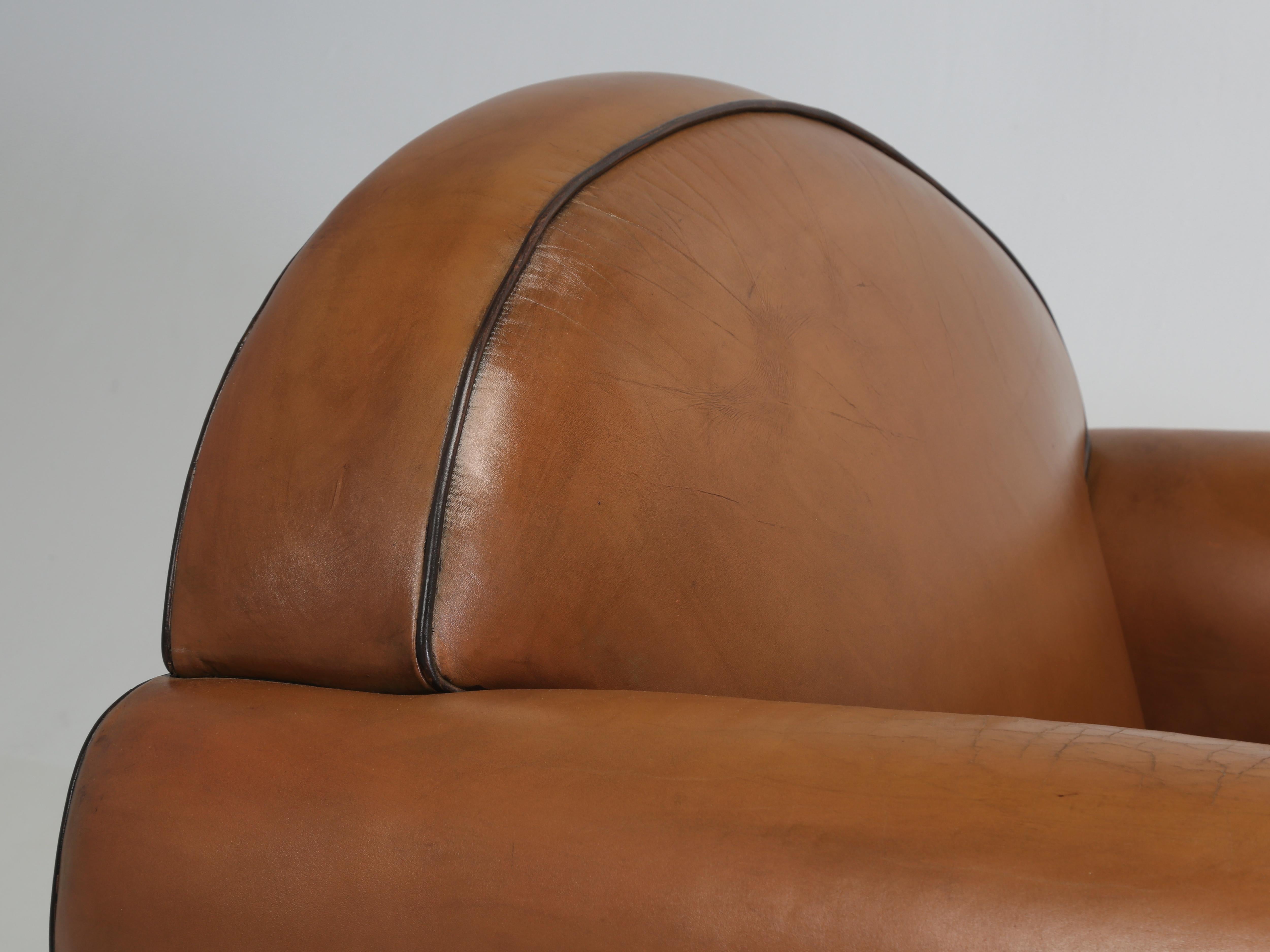 Hand-Crafted Vintage French Leather Club Chairs, by the French firm of HUGUES CHEVAL of Paris