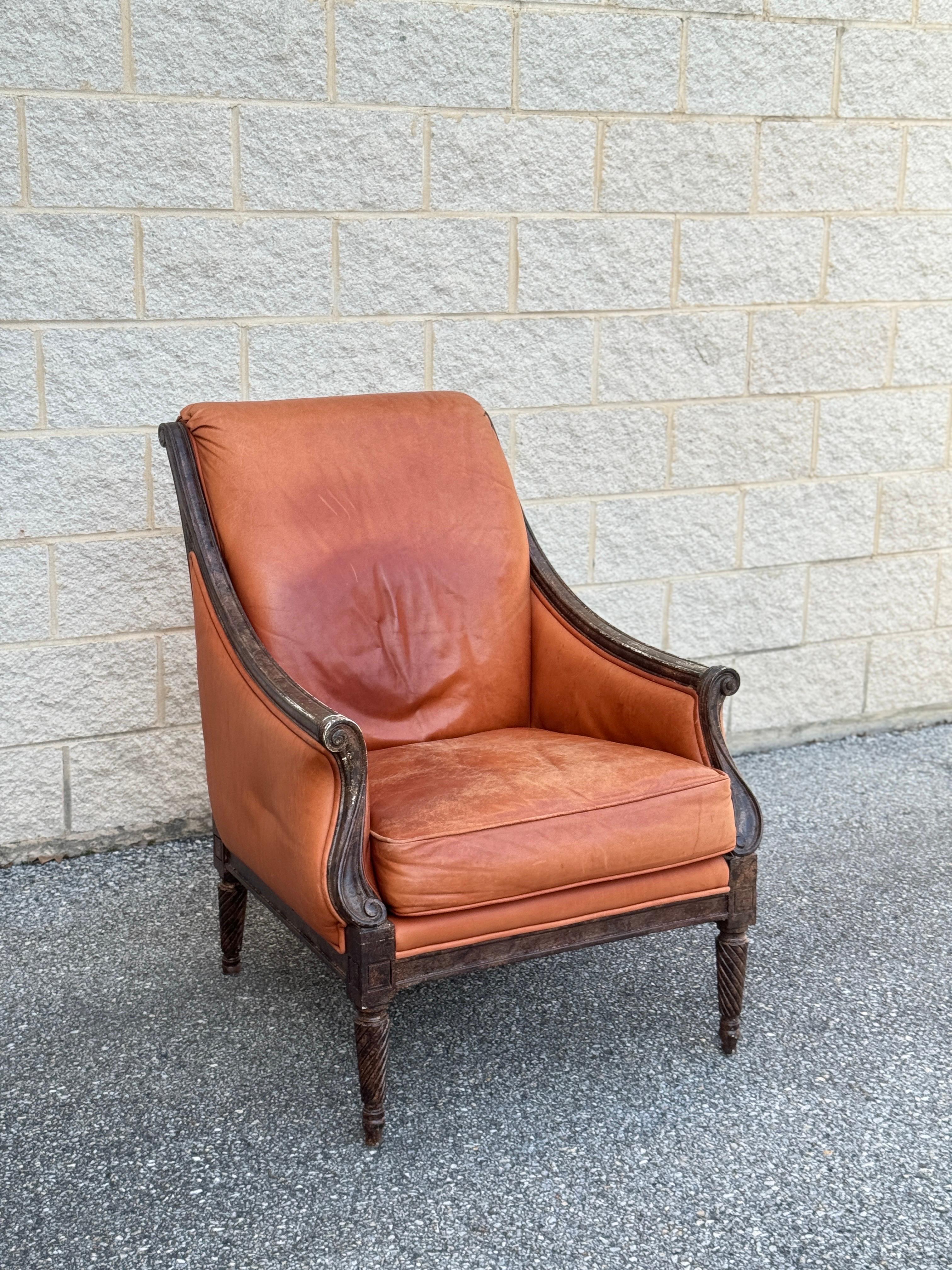 This Vintage French Leather Library Club Chair epitomizes the George IV style with its caramel-colored fine leather upholstery. A timeless piece, perfect for adding character to any library or living space.