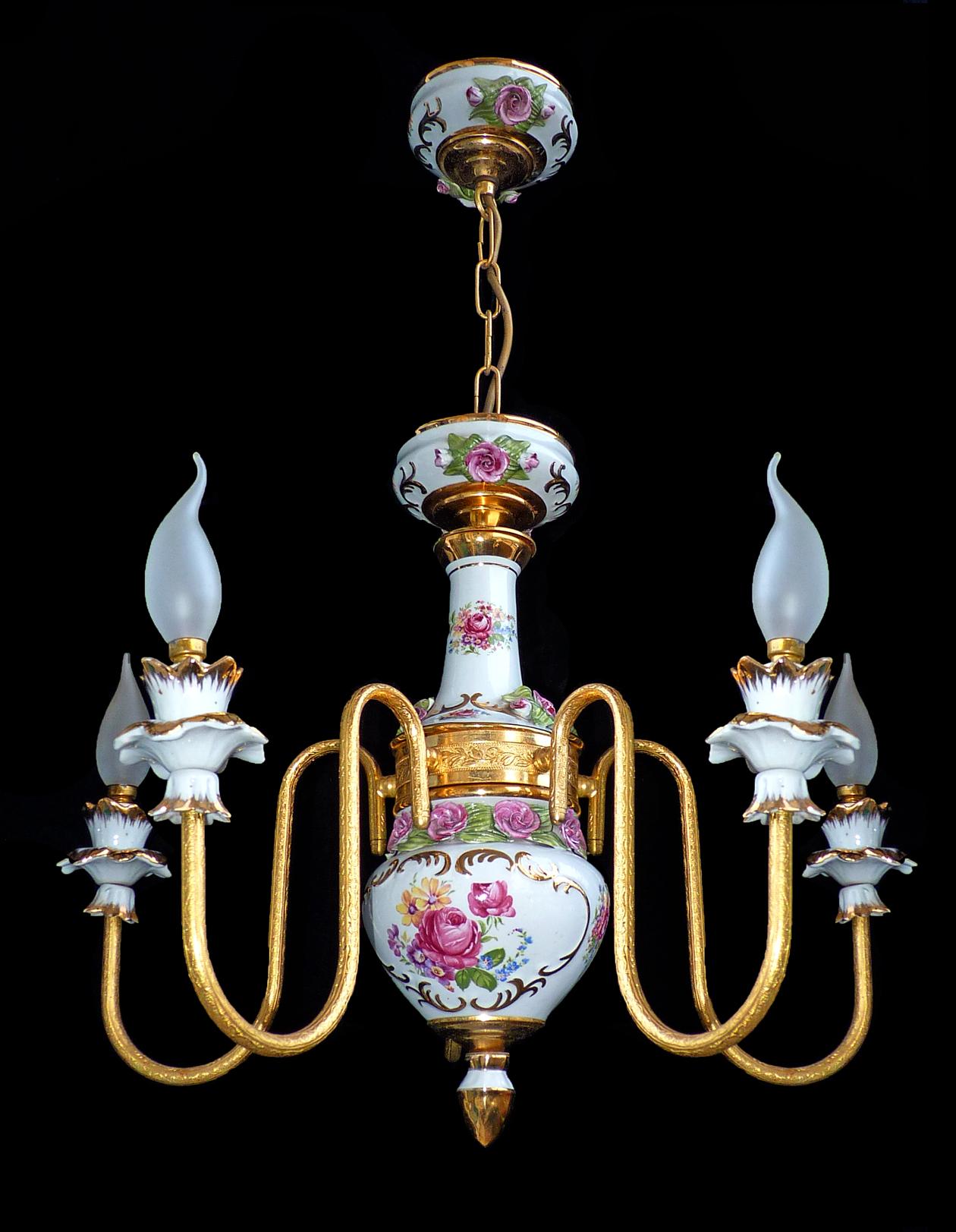 Gorgeous French Limoges style porcelain chandelier with five-light bulbs and sculpted applique porcelain roses, leaves and gilt brass
Measures:
Diameter 23.6 in/ 60 cm
Height 29.5 in/ 75 cm, Chain (20 cm)
Weight: 10 lb/ 5 Kg
Five light bulbs E14/ 60