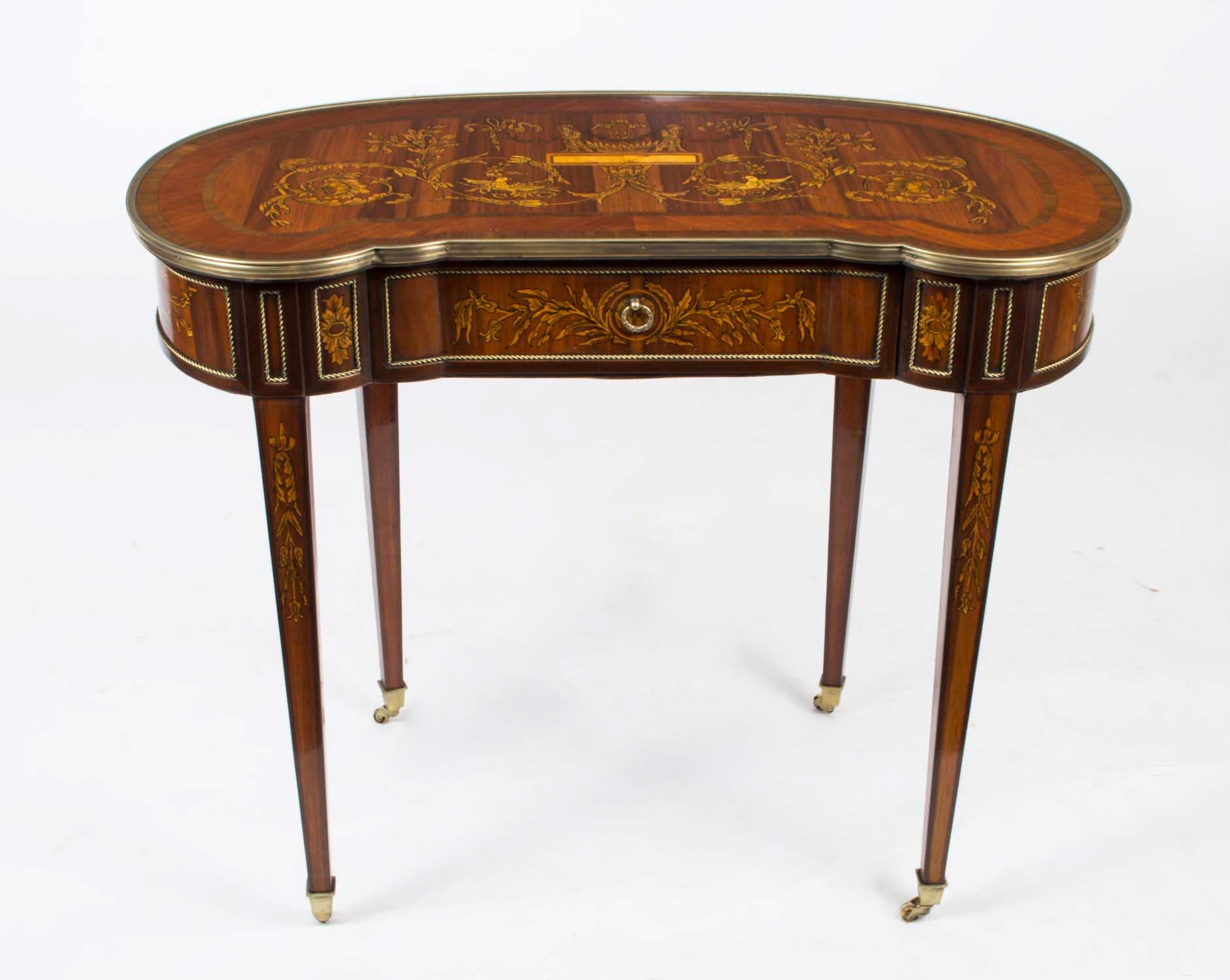 If you are looking for an attractive period style desk but have limited space then this could be the one for you. We are offering this compact French Louis Revival writing table, fitted with decorative ormolu mounts and dating from the last quarter