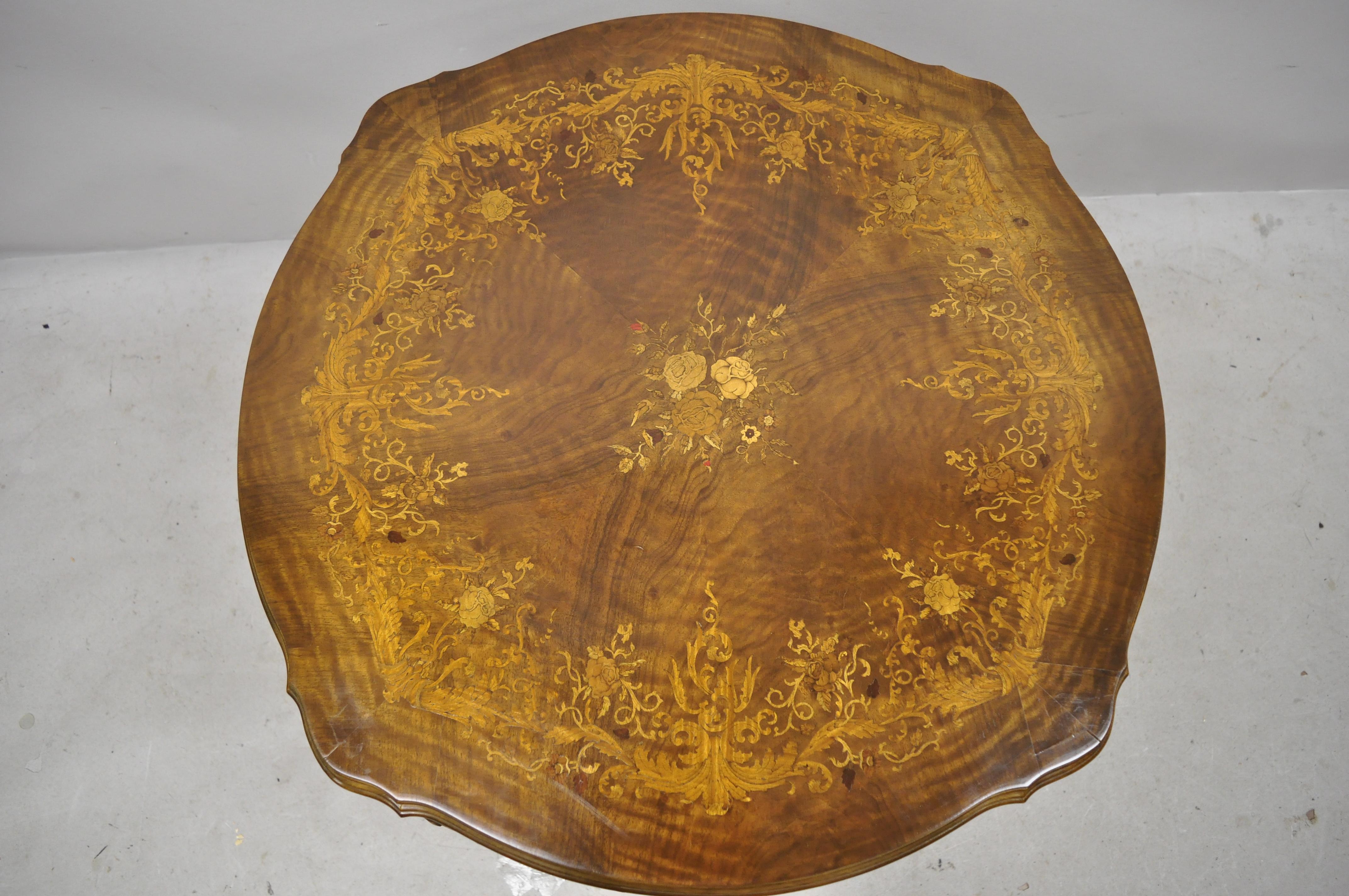 Vintage French Louis XV style floral satinwood inlay round walnut coffee table side table. Item features floral satinwood inlay, nicely carved details, cabriole legs, very nice antique item, quality craftsmanship, great style and form, circa early