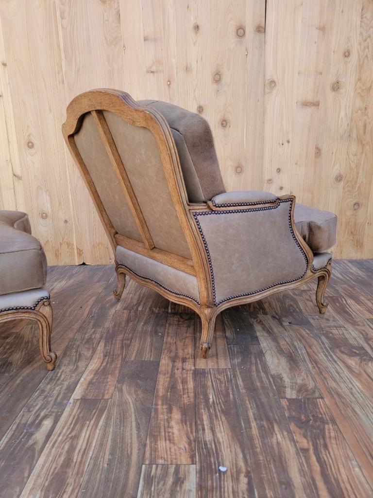 Vintage French Louis XV Style Carved Distressed Maple Finish Bergere Chair & Ottoman Newly Upholstered in Egyptian Sand Distressed Leather & Brazilian Hair-On Cowhide with Nail Head Trim - 2 Piece Set 

Gorgeous, vintage French Louis XV style