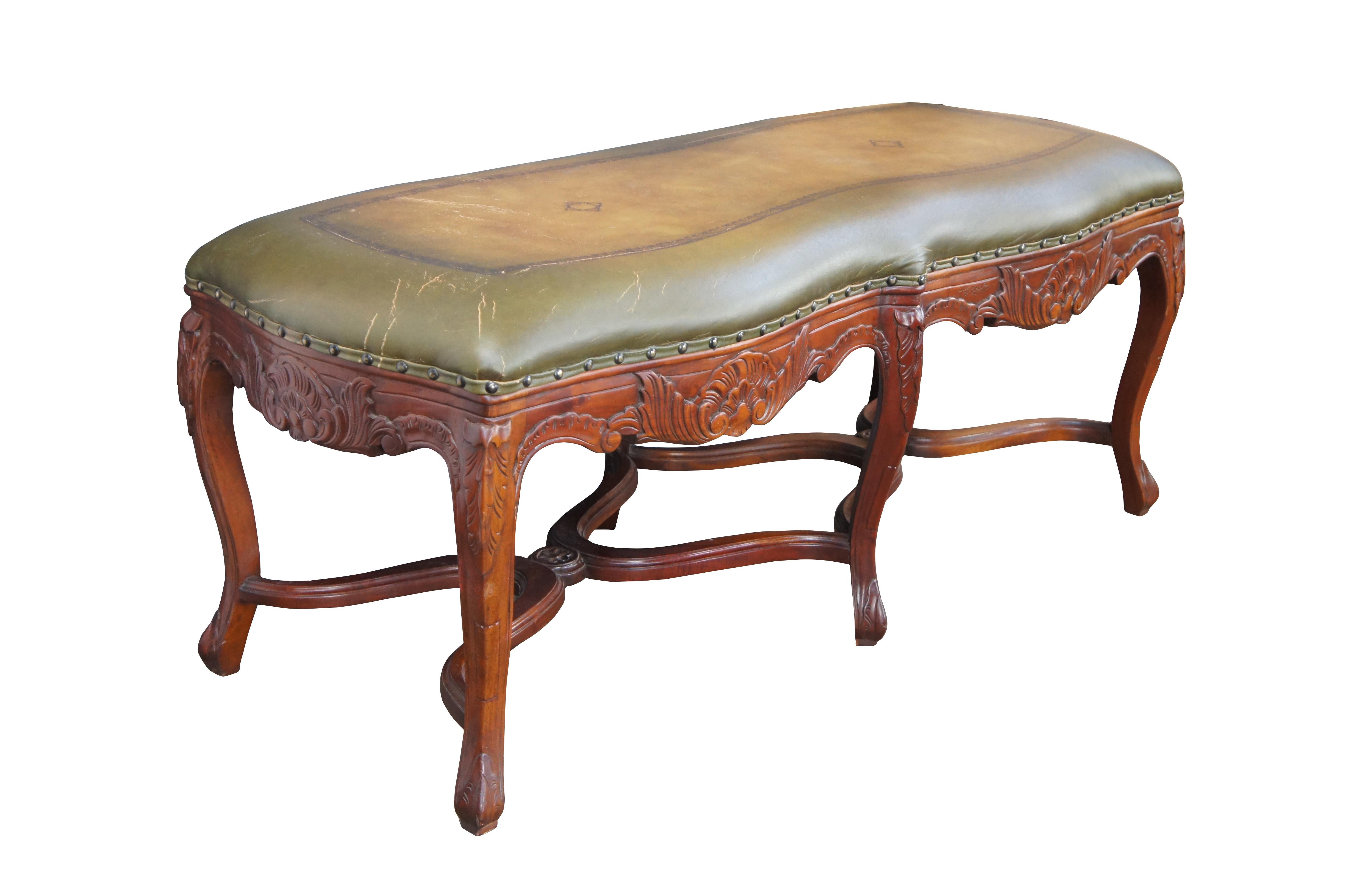 Late 20th Century French inspired foyer / window bench. Features tooled leather green upholstery over carved mahogany frame with cabriole legs and double x form stretchers.

Dimensions:
49